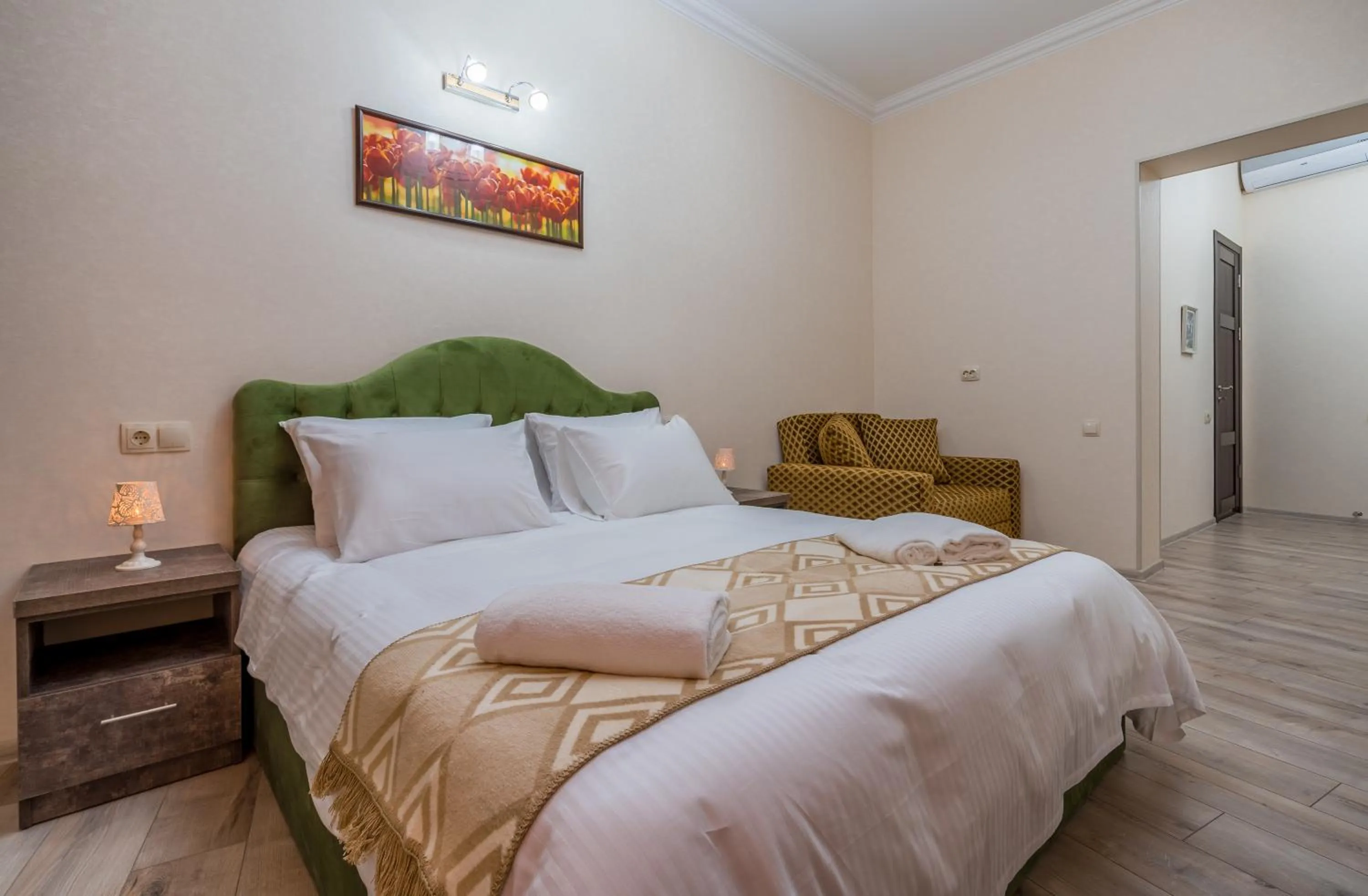 Bed in Golden Light Hotel