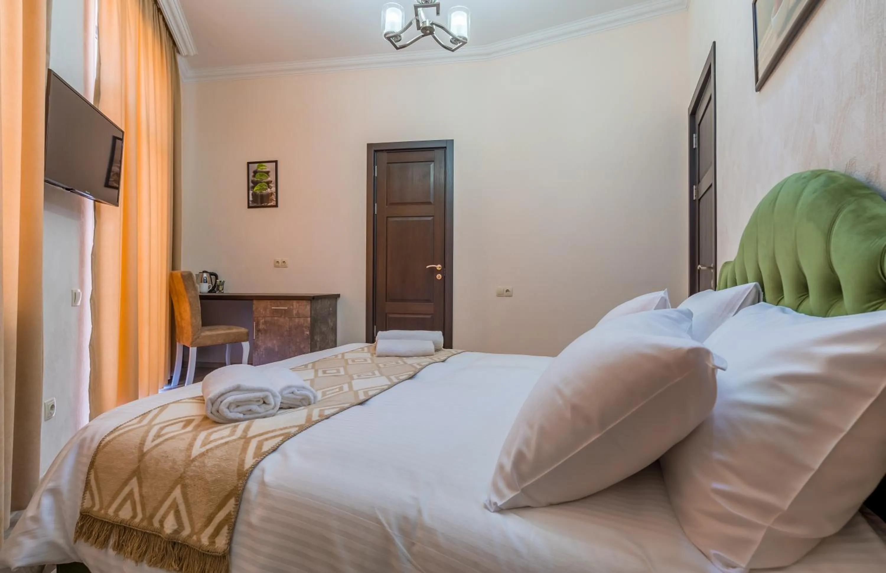 Photo of the whole room, Bed in Golden Light Hotel