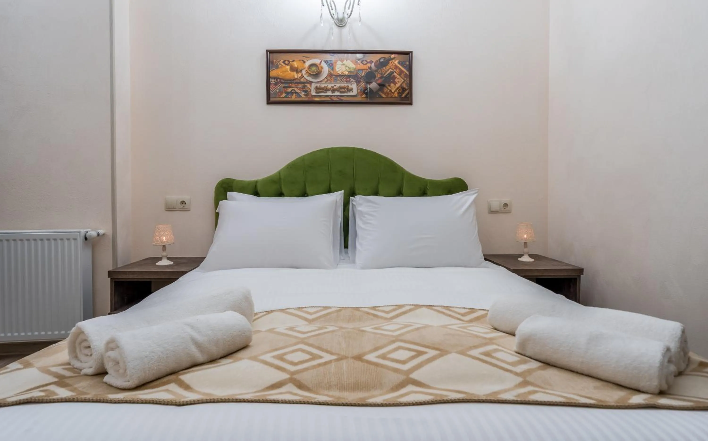 Bed in Golden Light Hotel