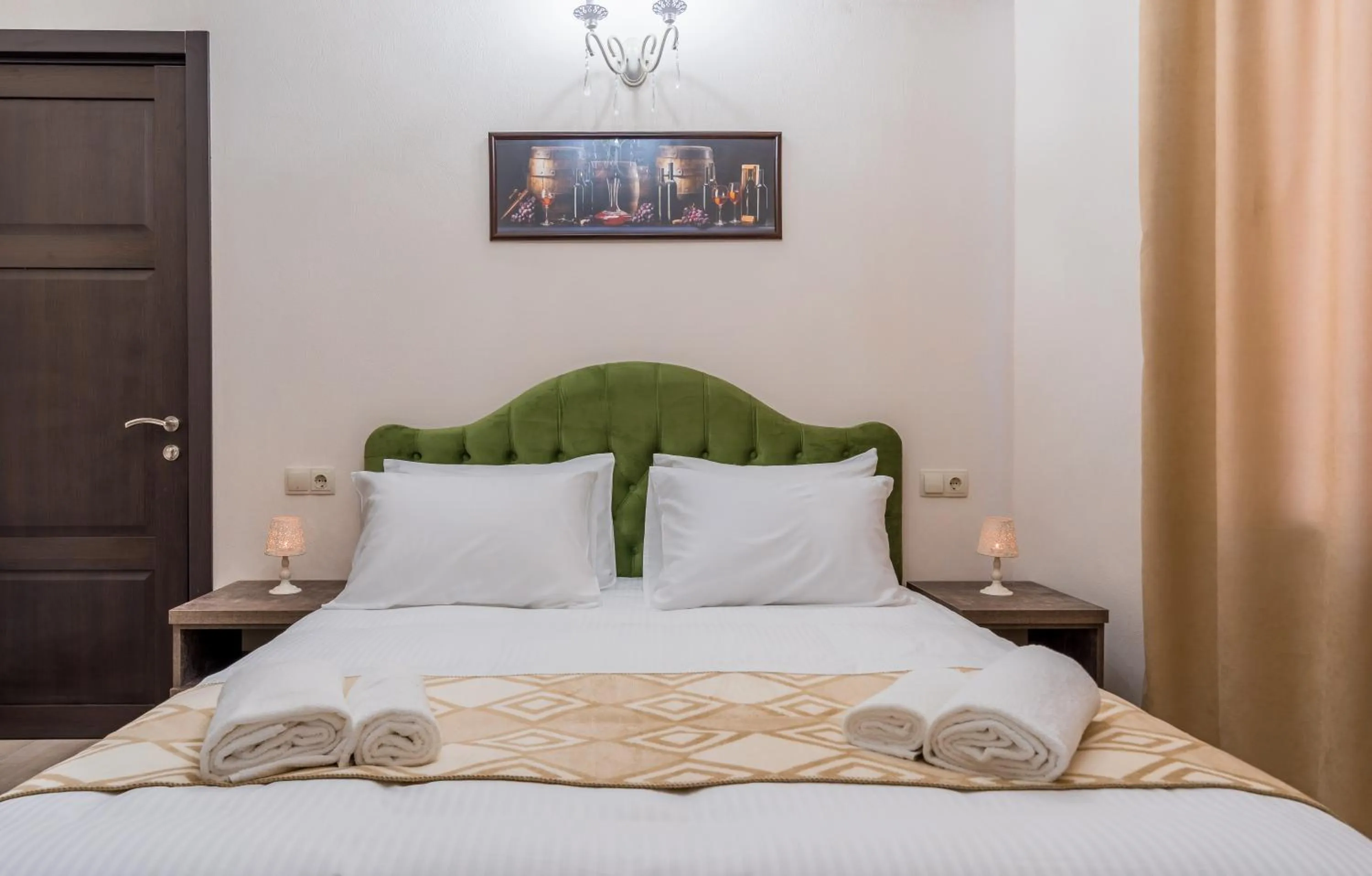 Bed in Golden Light Hotel