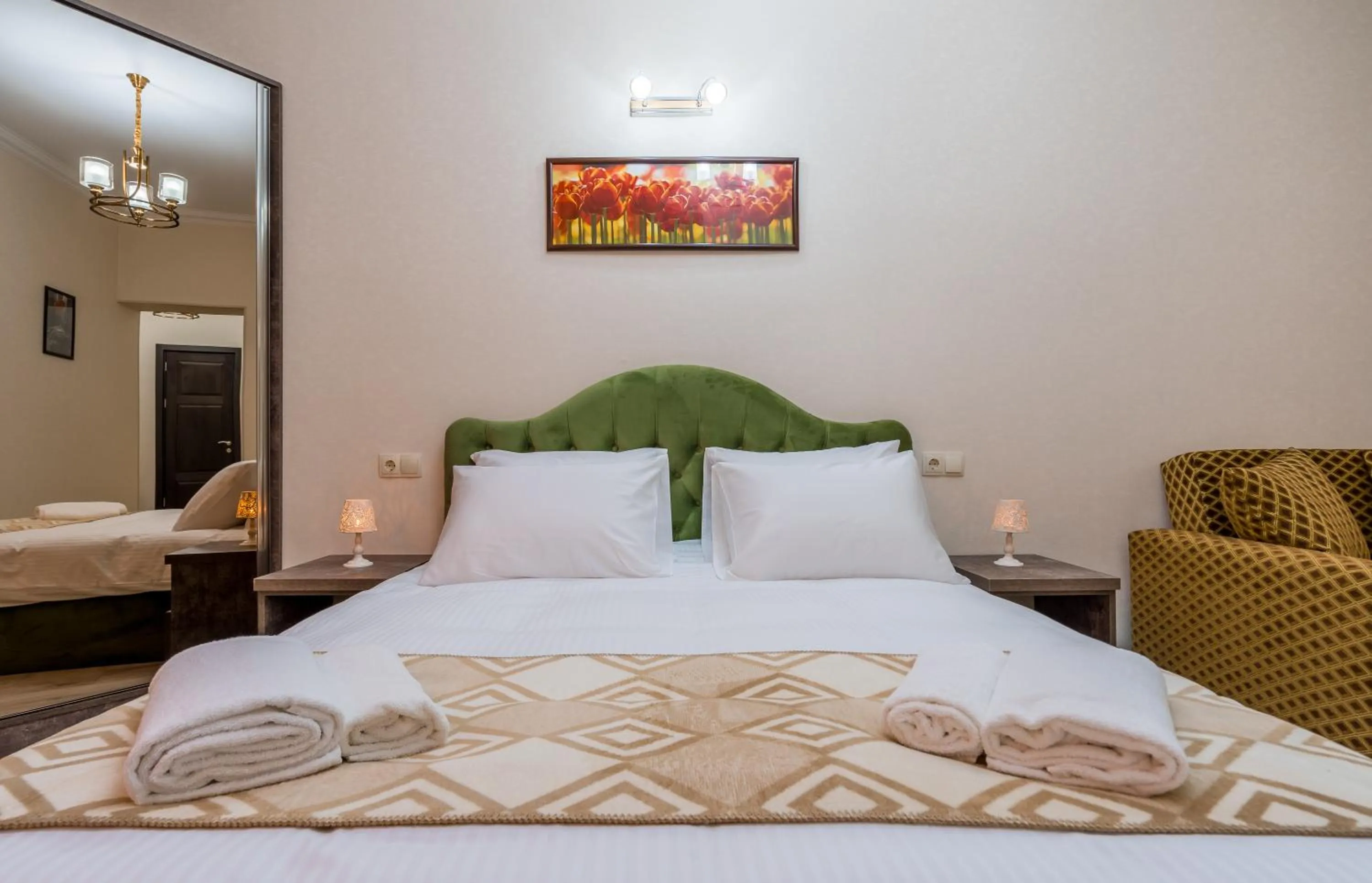 Bed in Golden Light Hotel