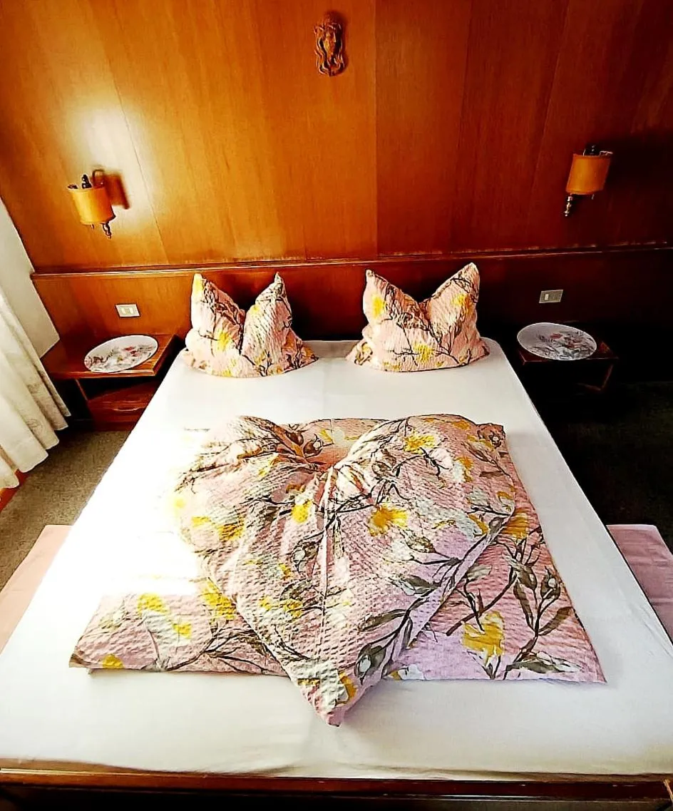 Bed in Gasthof Stiegenwirt