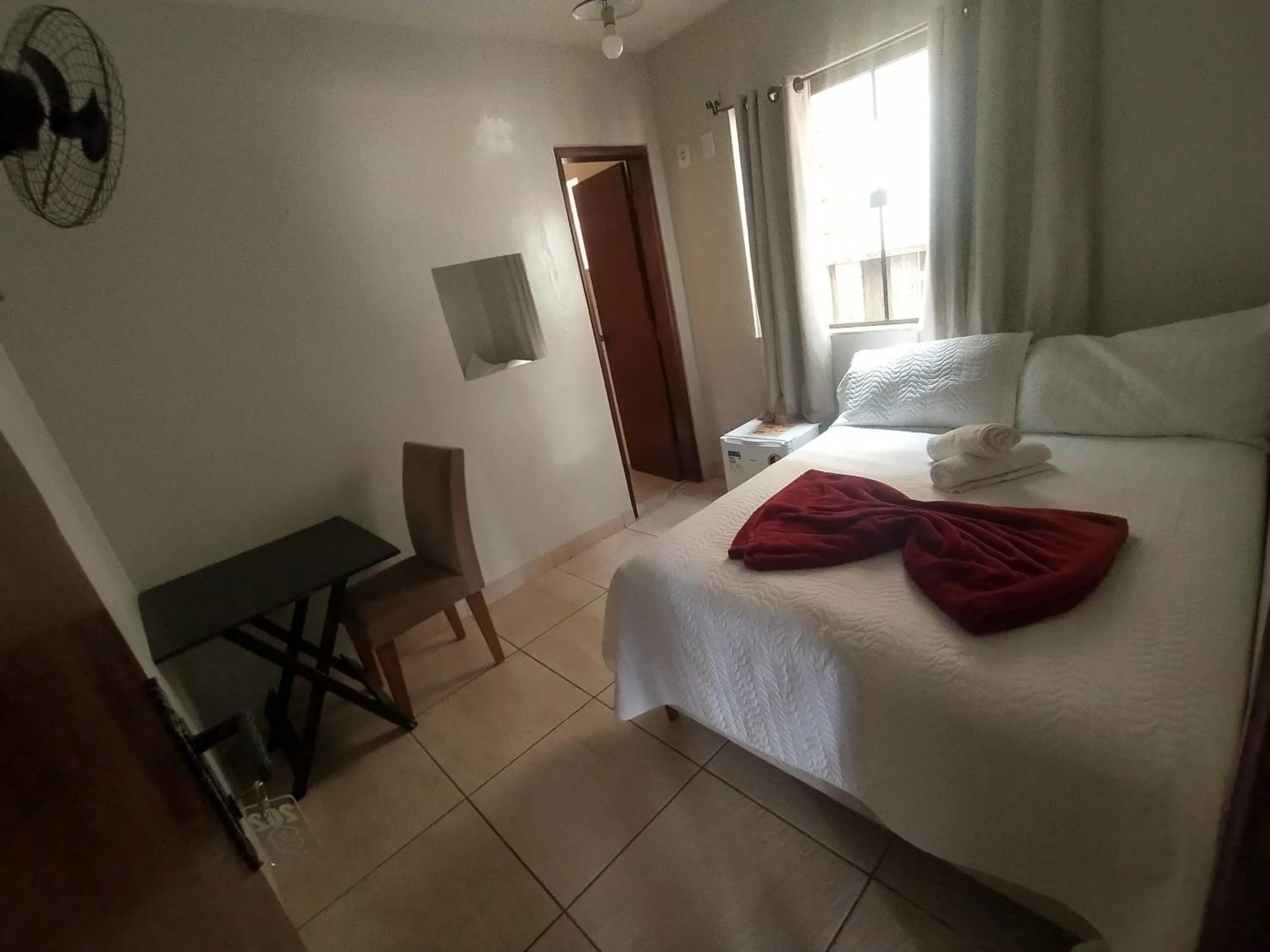 Bed in Pousada Acayaca