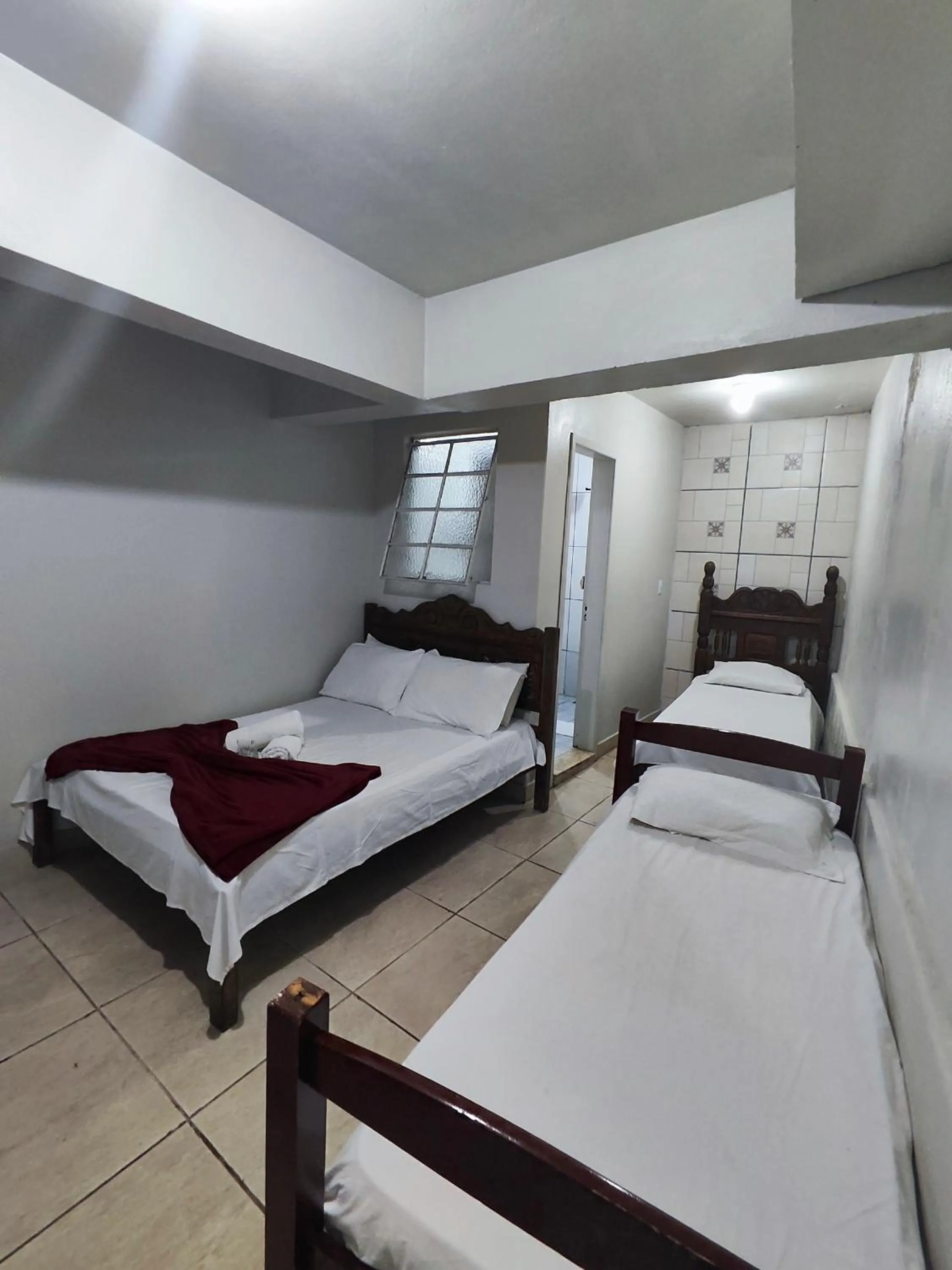 Bed in Pousada Acayaca