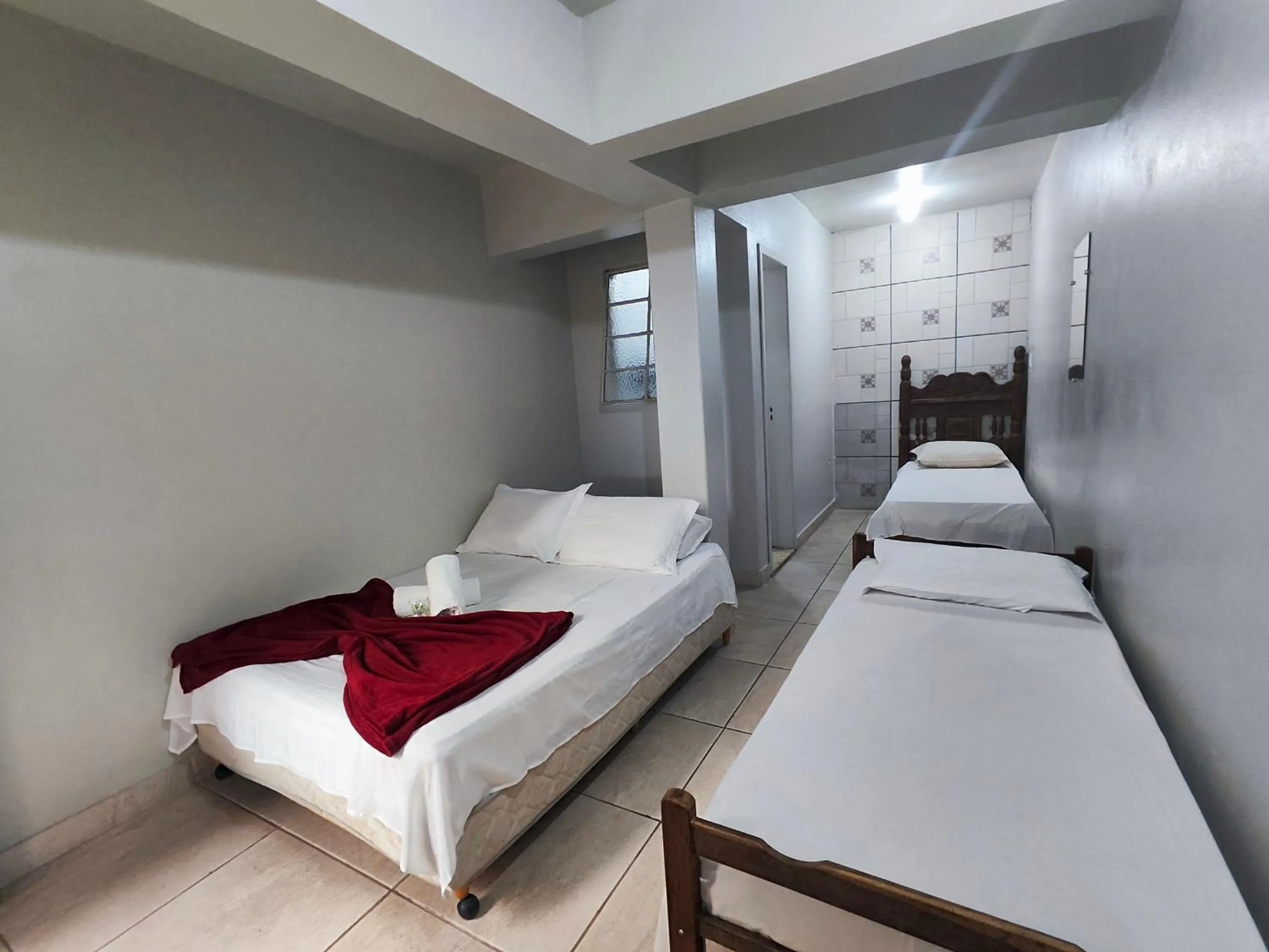 Bed in Pousada Acayaca