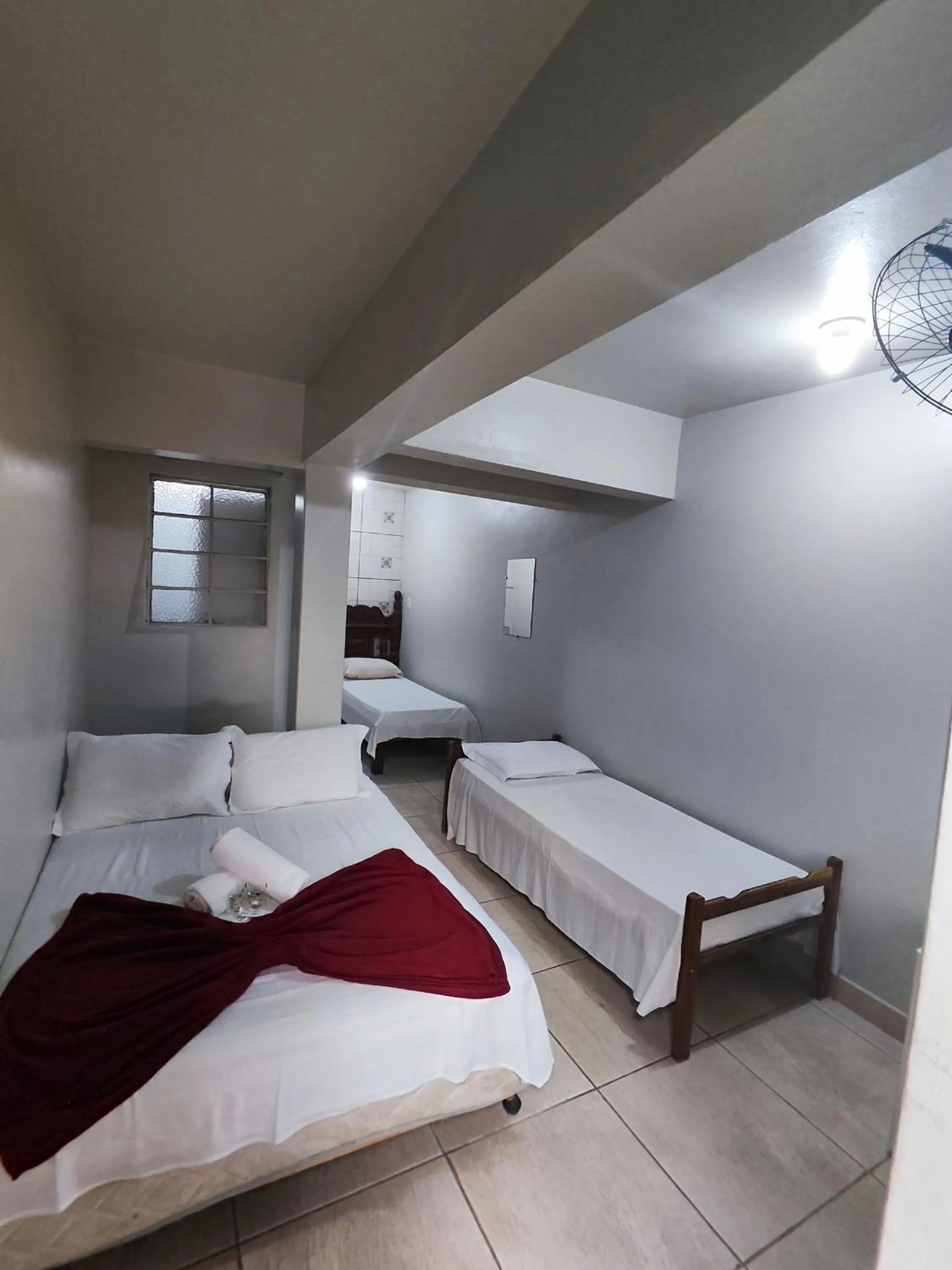 Bed in Pousada Acayaca