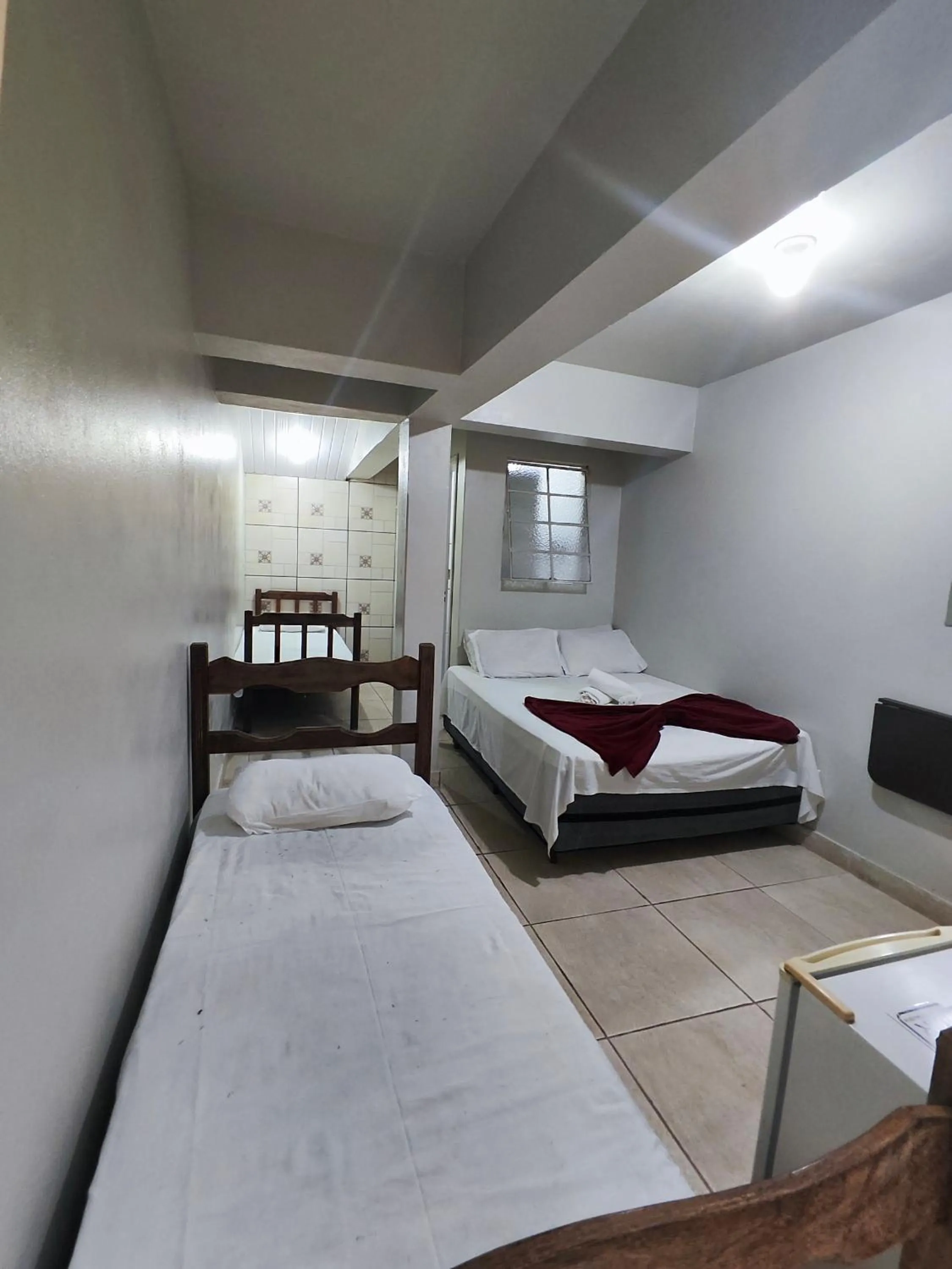 Bed in Pousada Acayaca