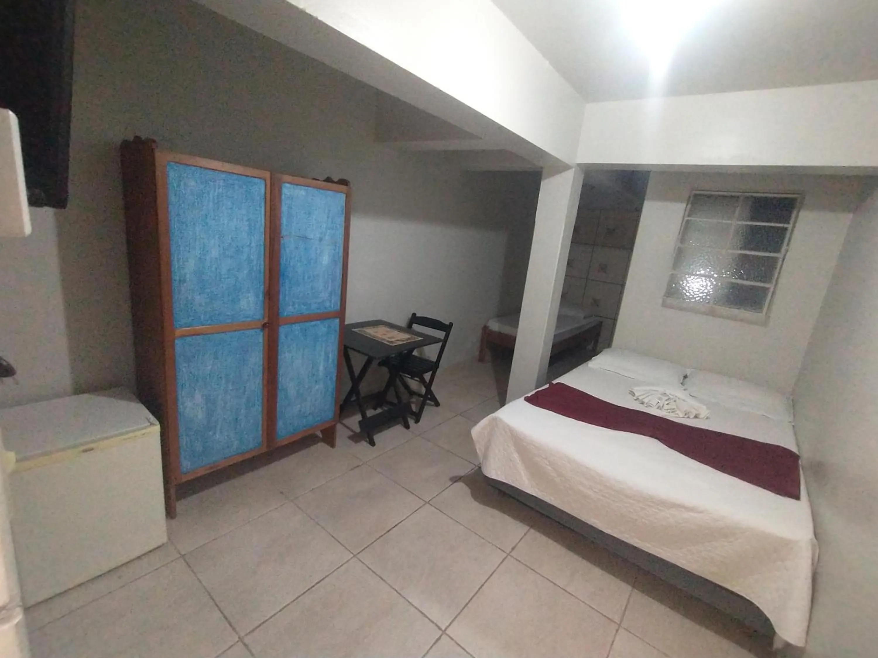 Bed in Pousada Acayaca