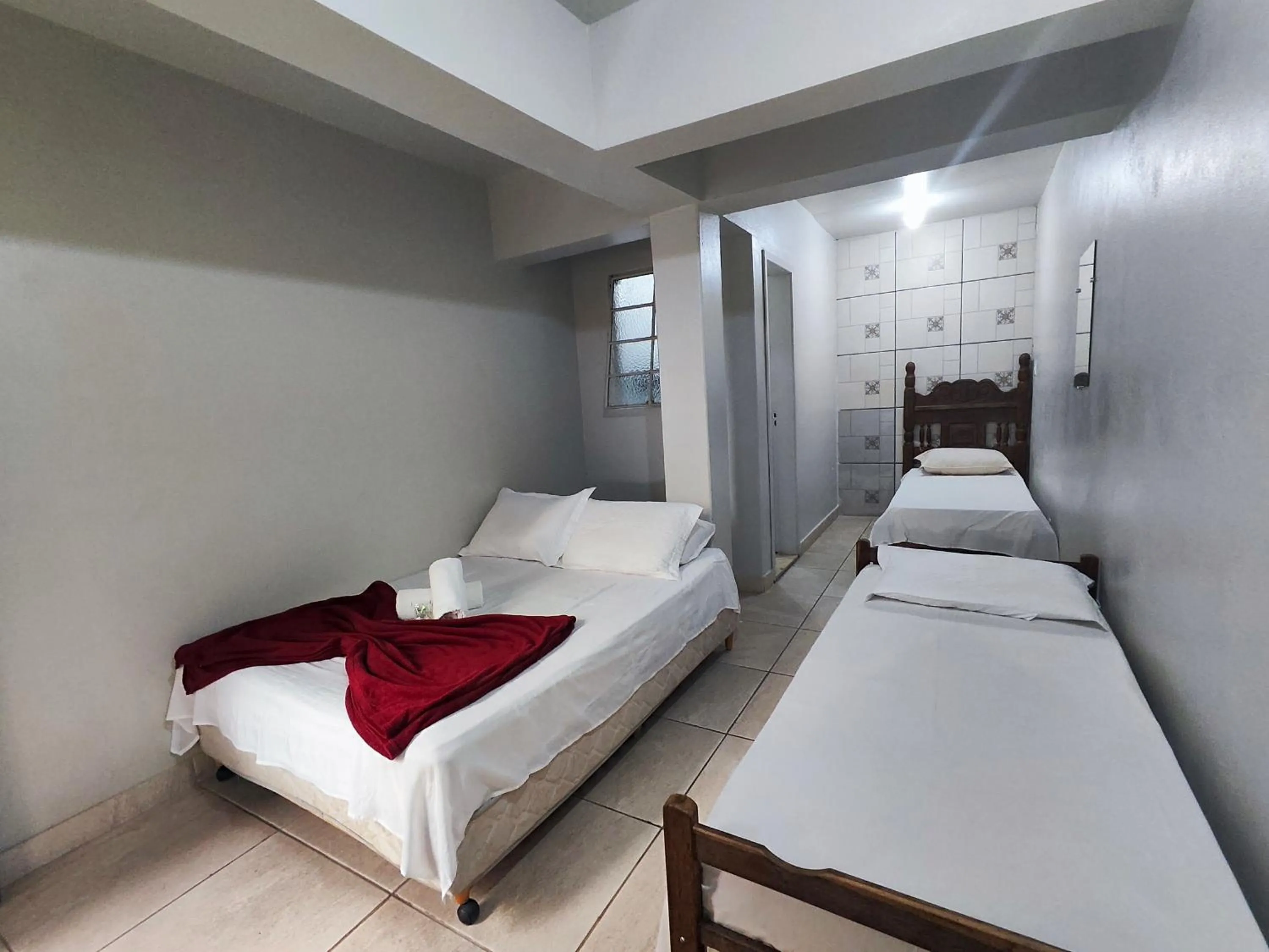 Bed in Pousada Acayaca