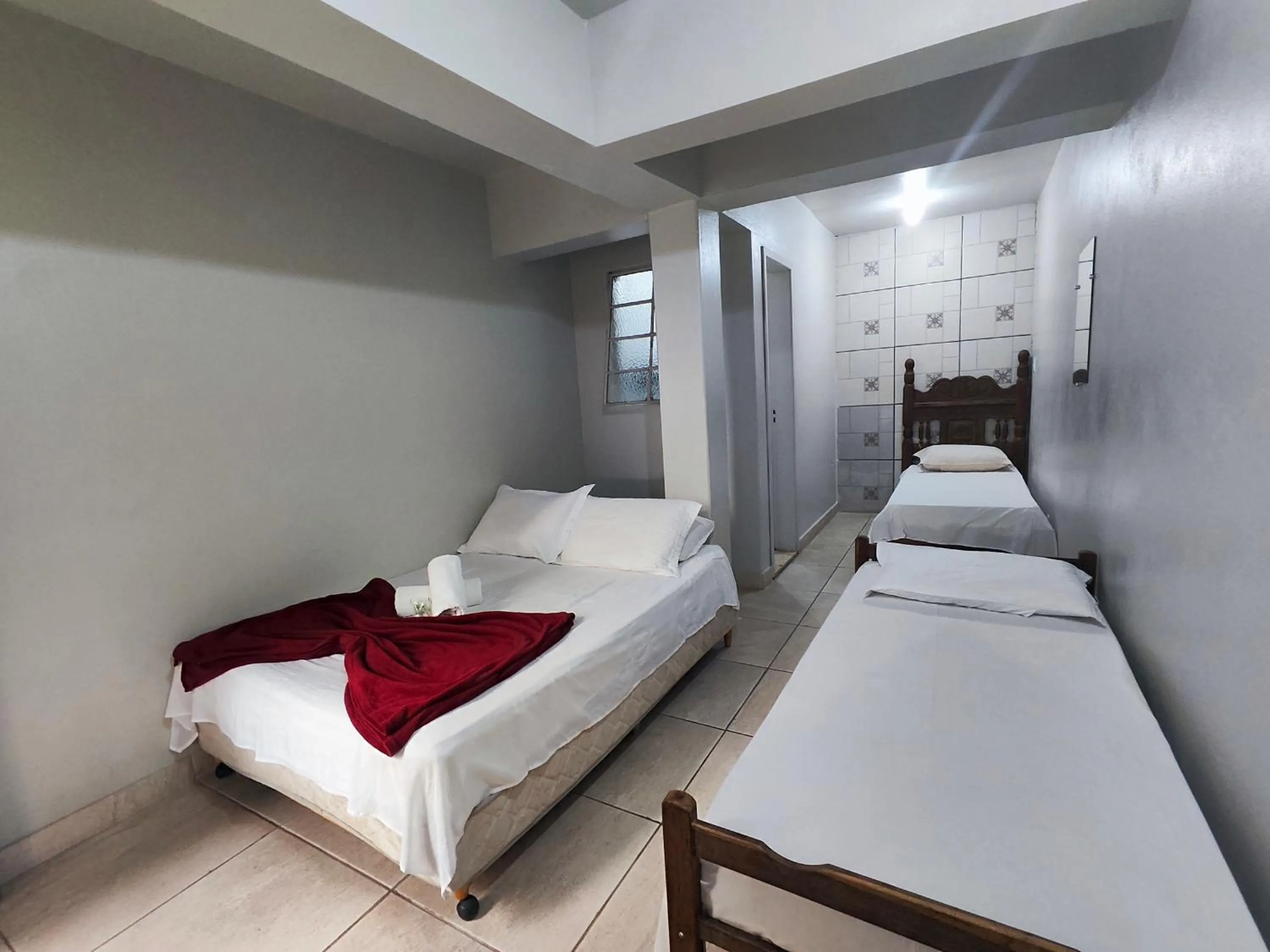 Bed in Pousada Acayaca