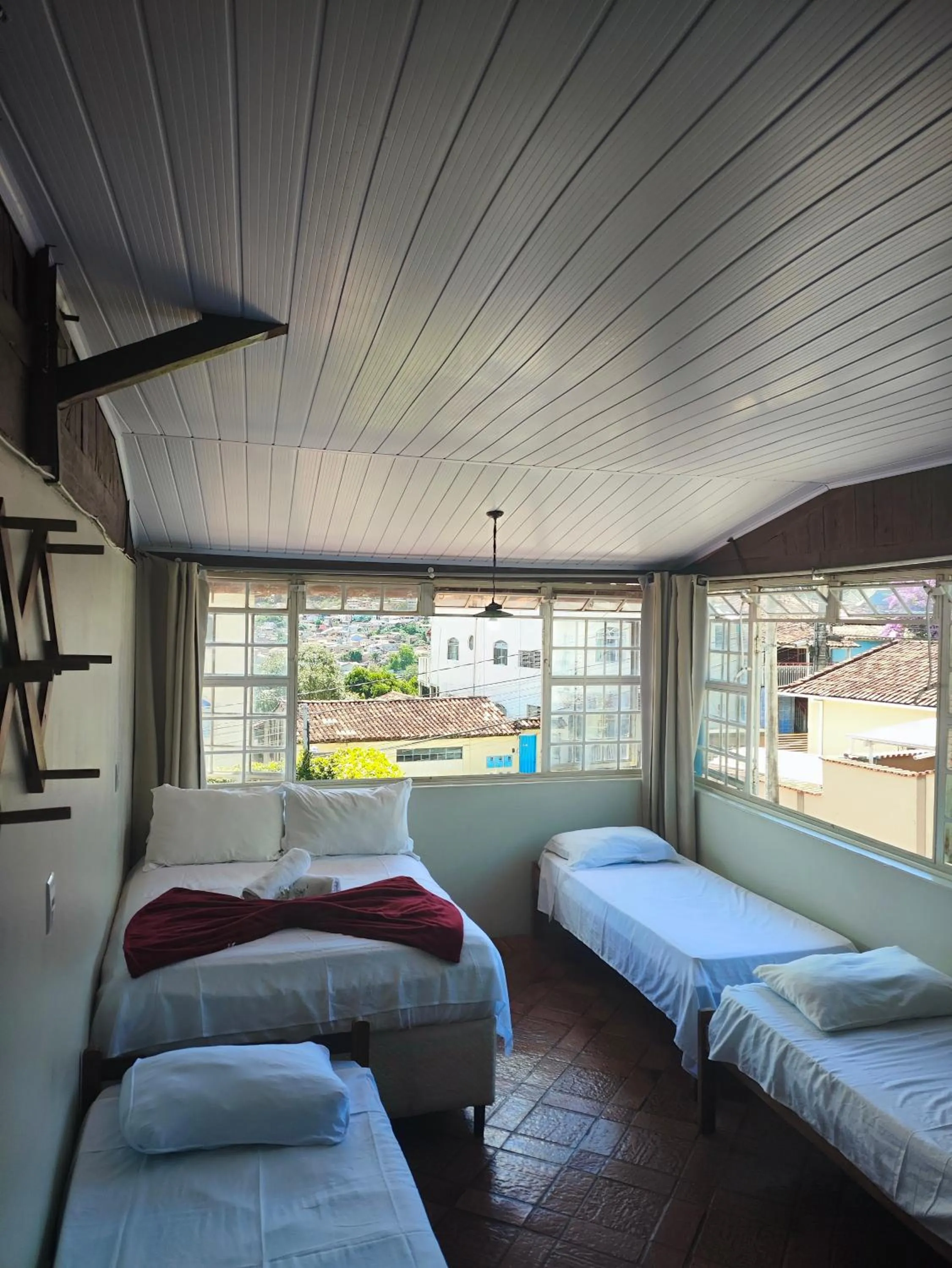 Bed in Pousada Acayaca