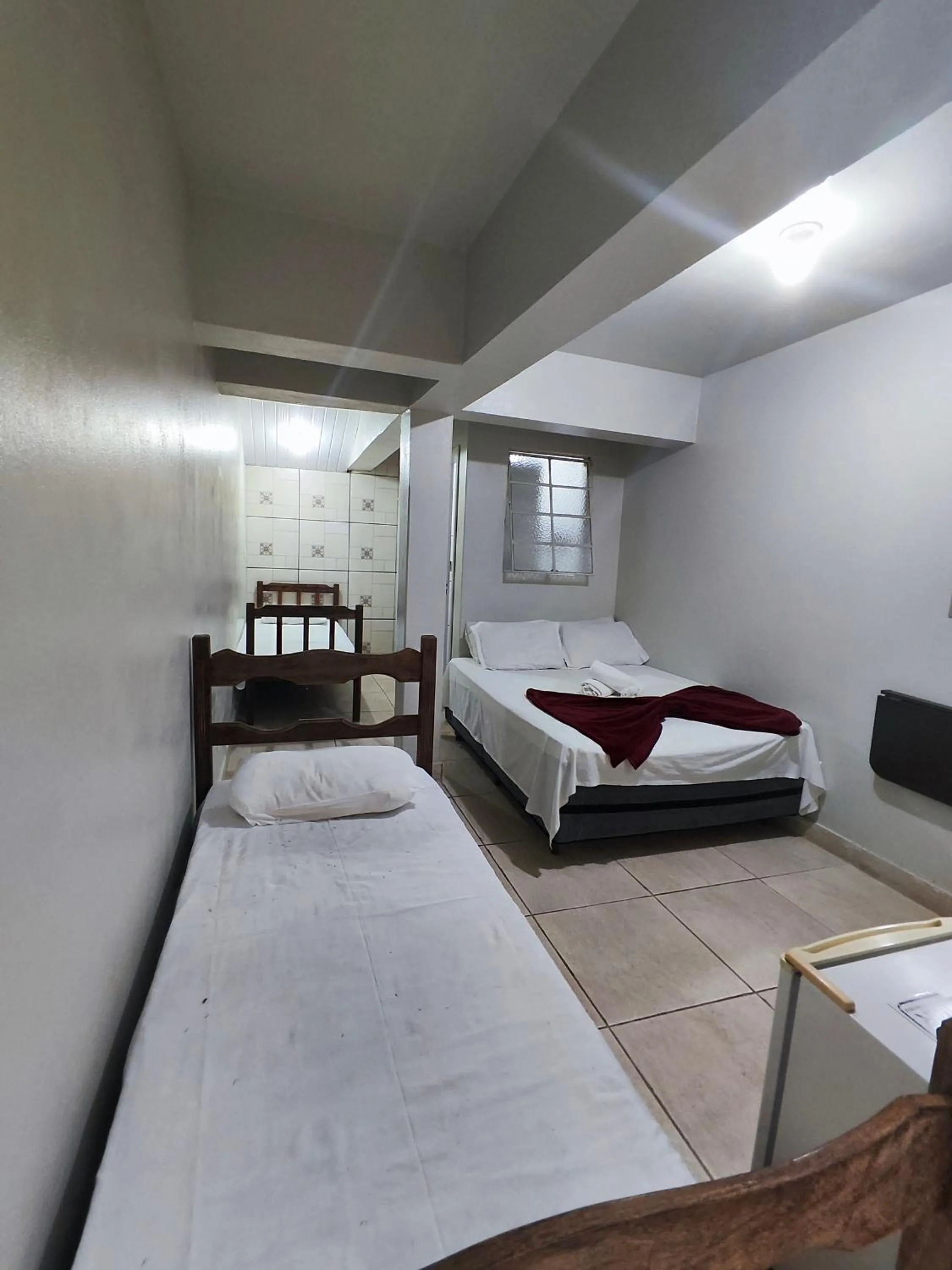 Bed in Pousada Acayaca