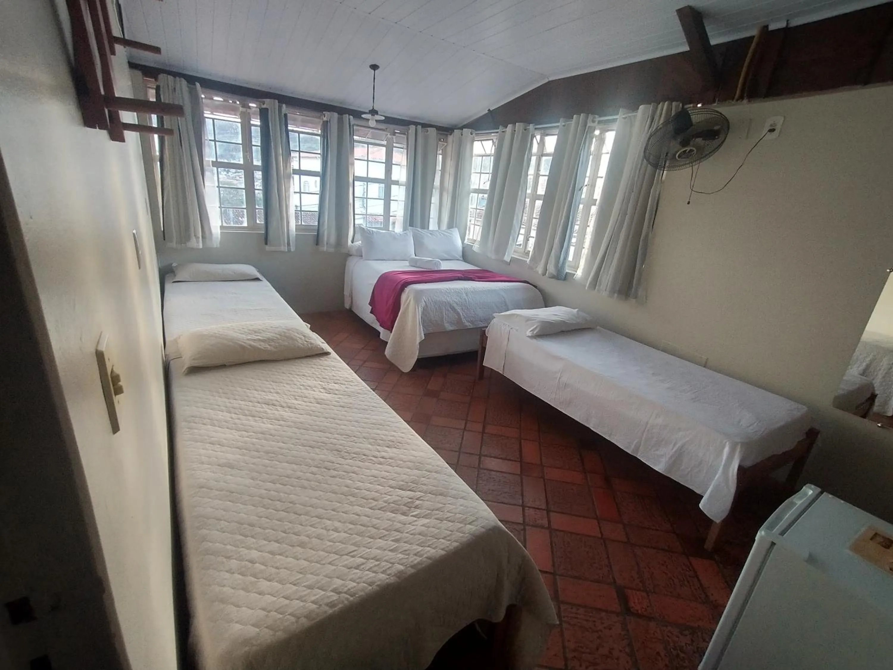 Bed in Pousada Acayaca