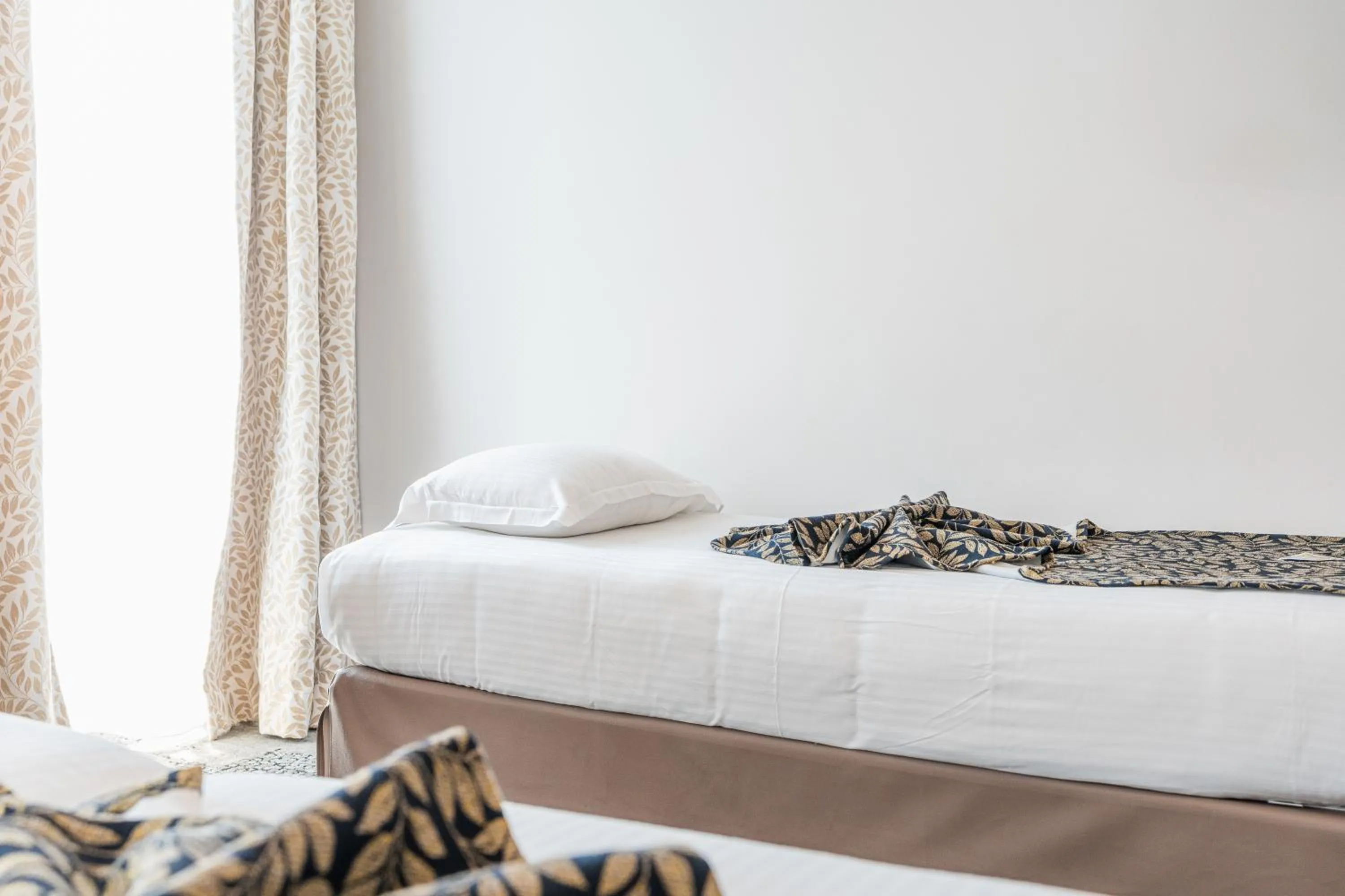 Bed in Hotel Villa Victoria