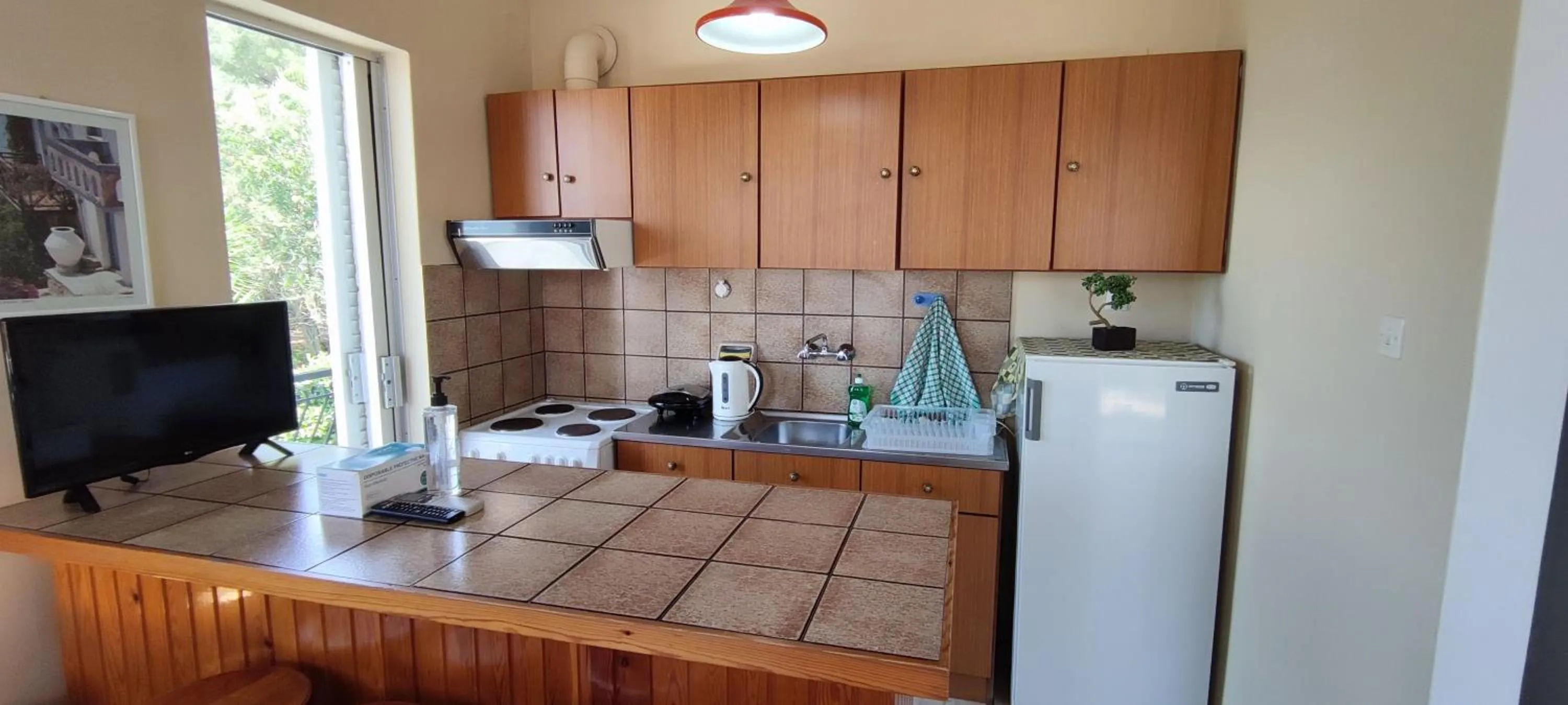 Kitchen or kitchenette in Anna Studio and Apartments