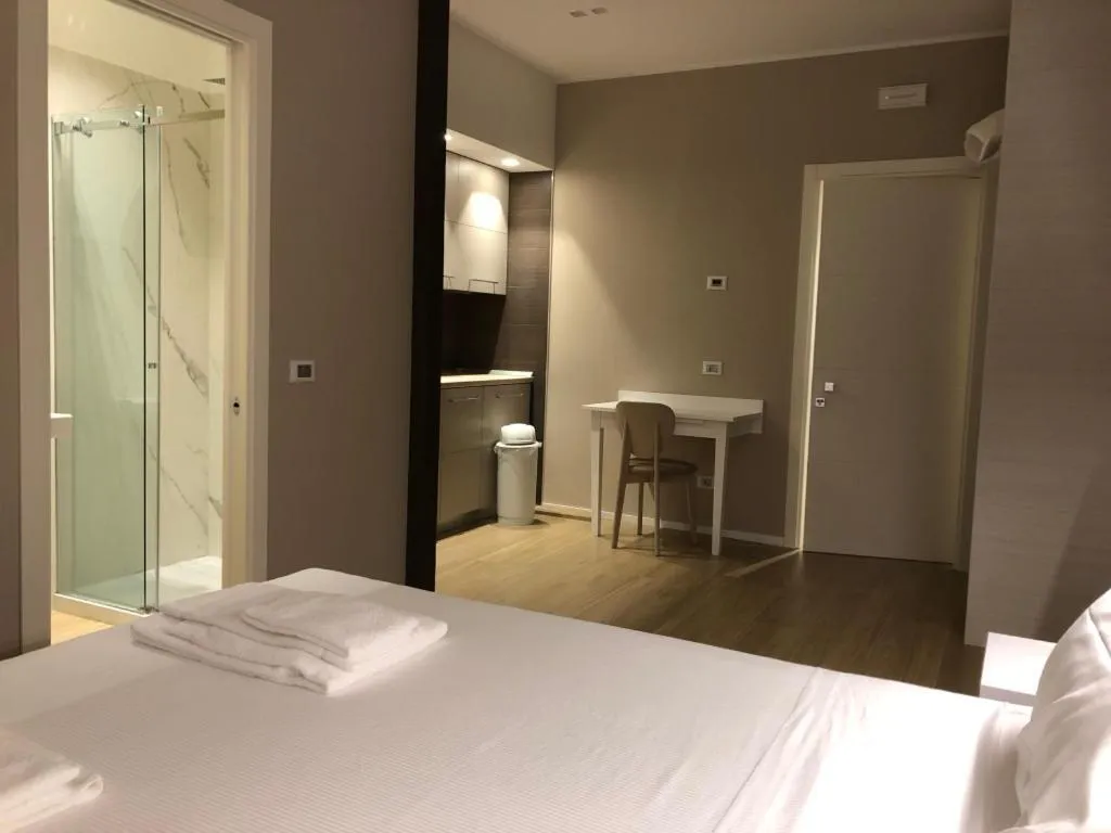 Bed in APPRODO RESiDENCE