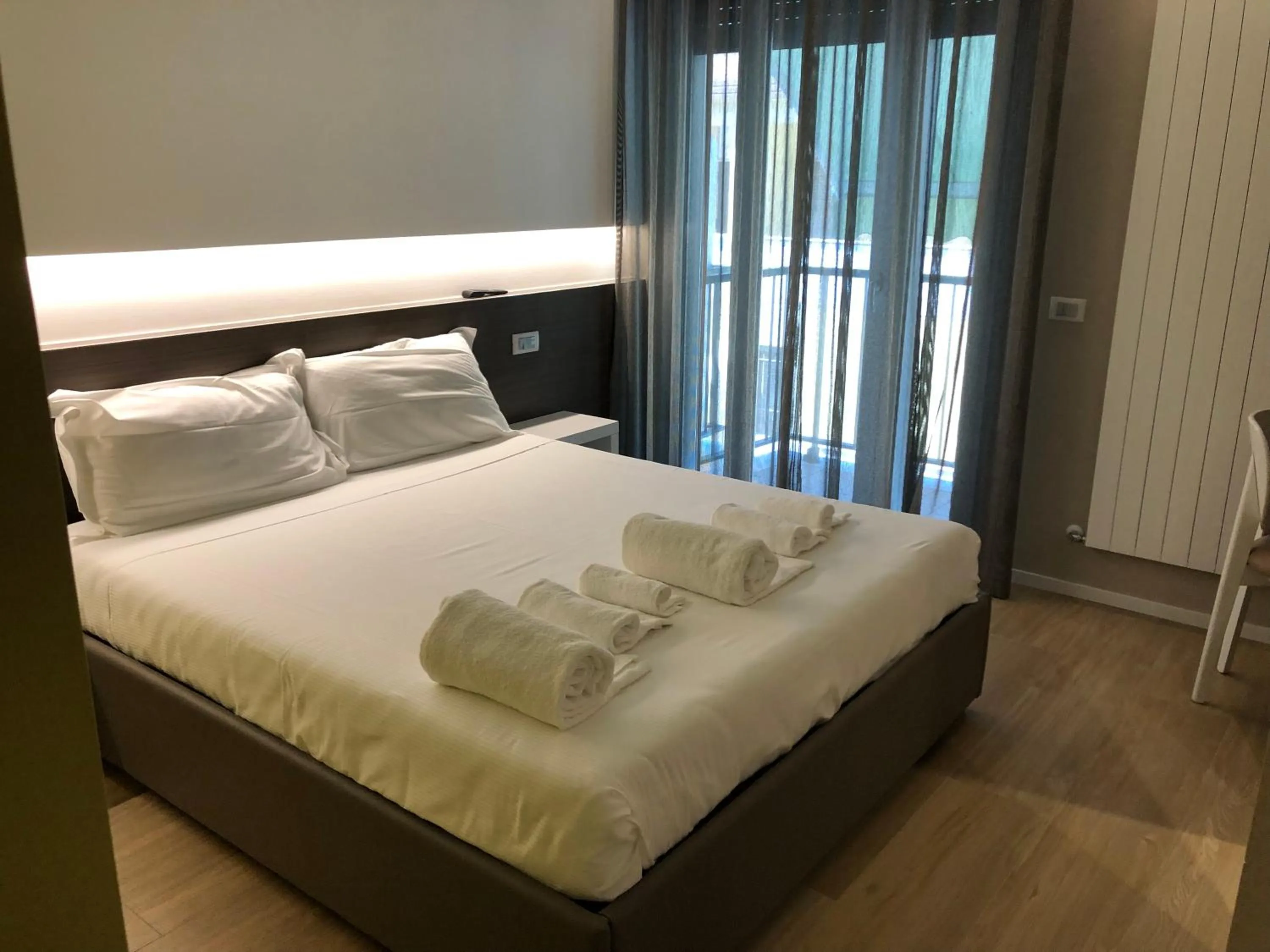 Bed in APPRODO RESiDENCE