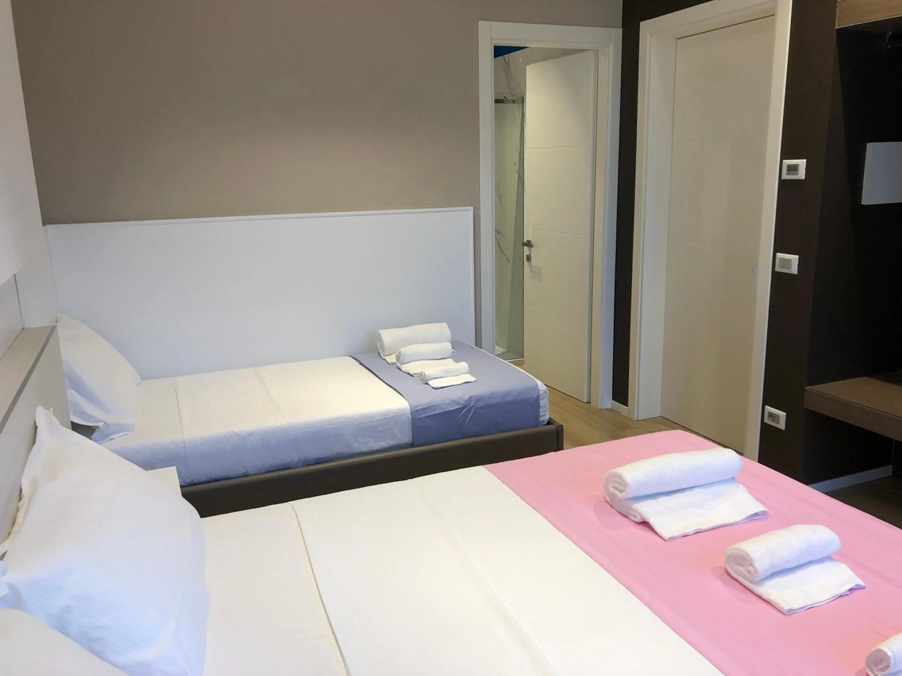 Bed in APPRODO RESiDENCE