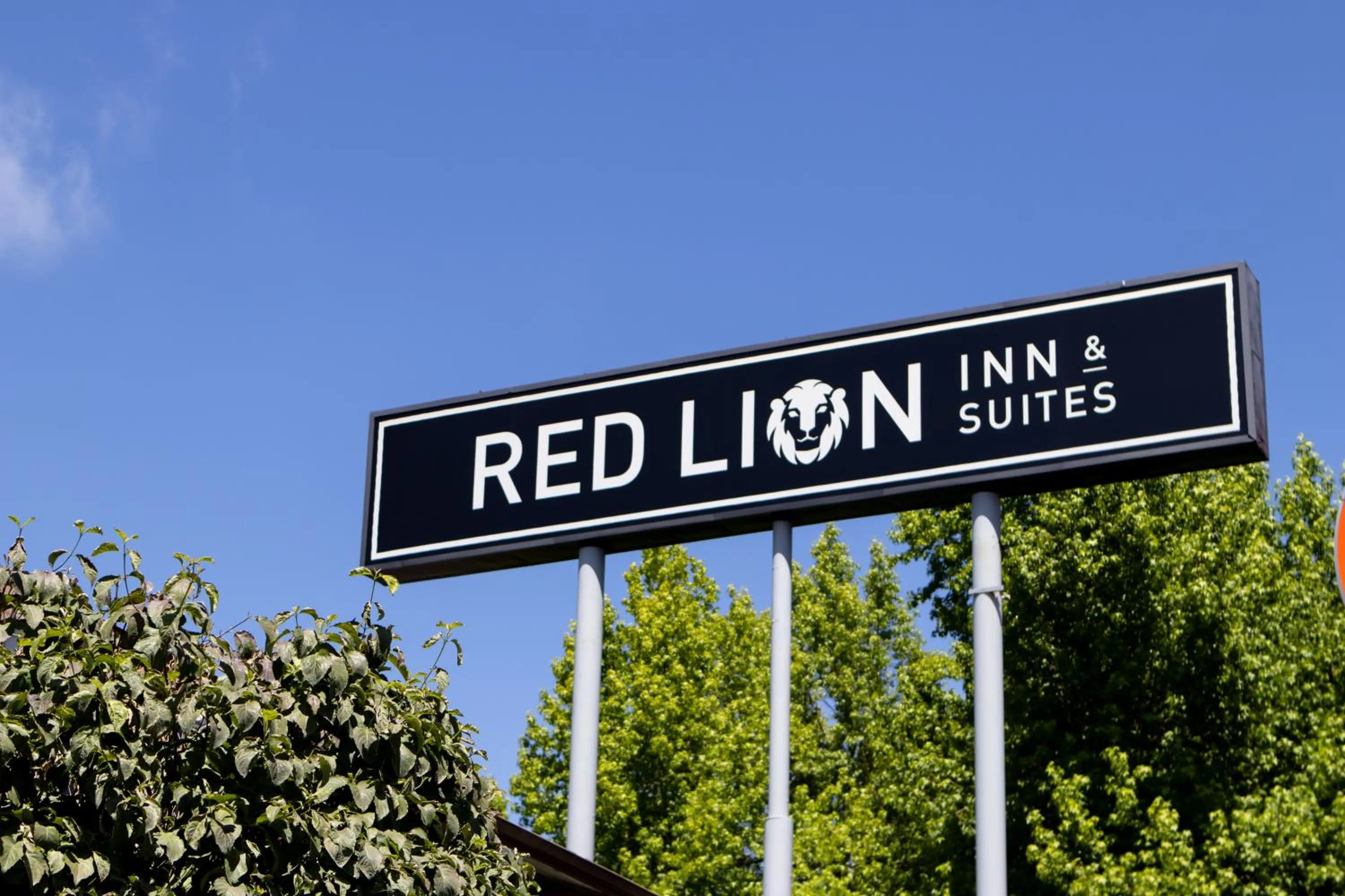 Property logo or sign in Red Lion Inn & Suites Vancouver