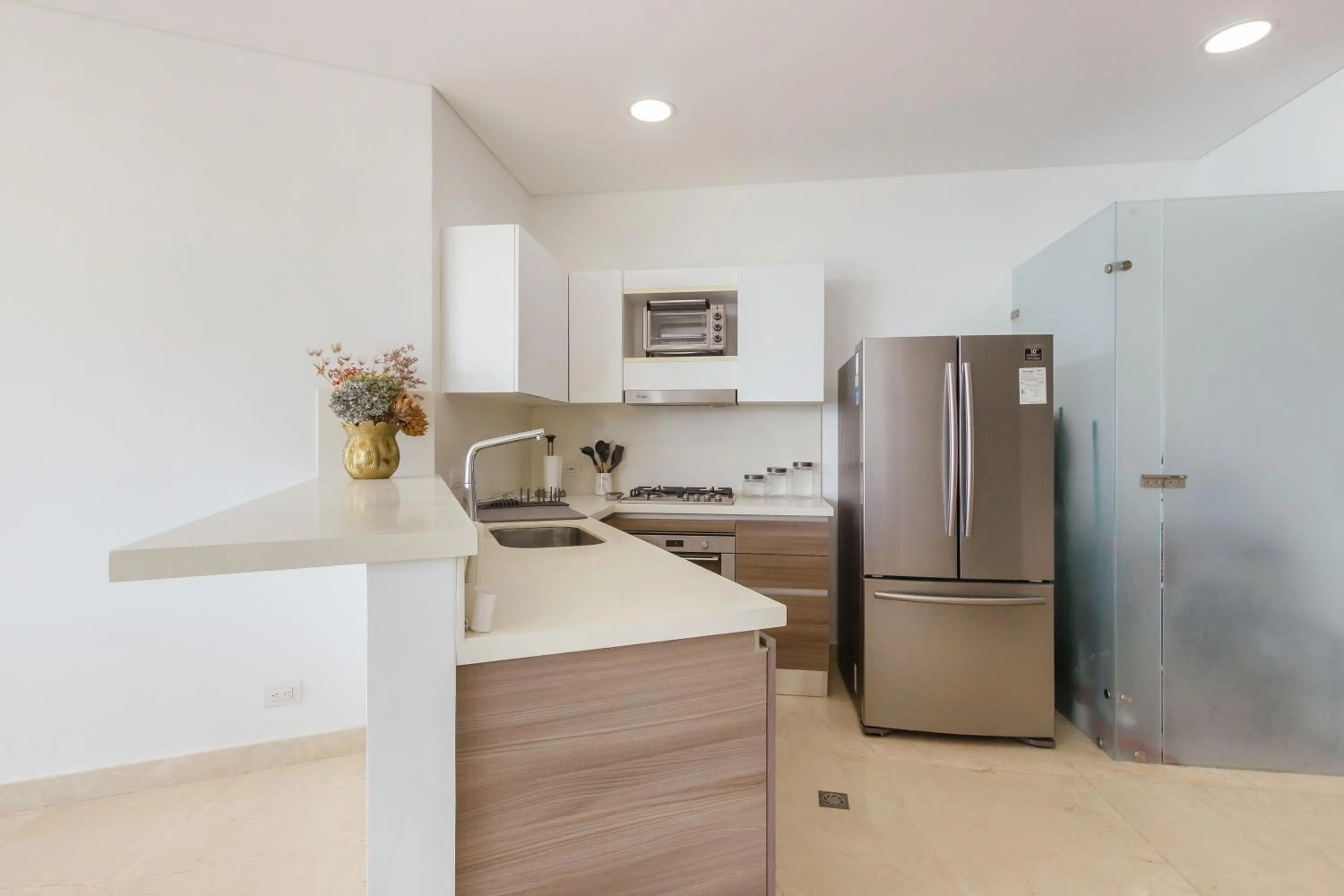 Kitchen or kitchenette in Grand Marina Suites Santa Marta