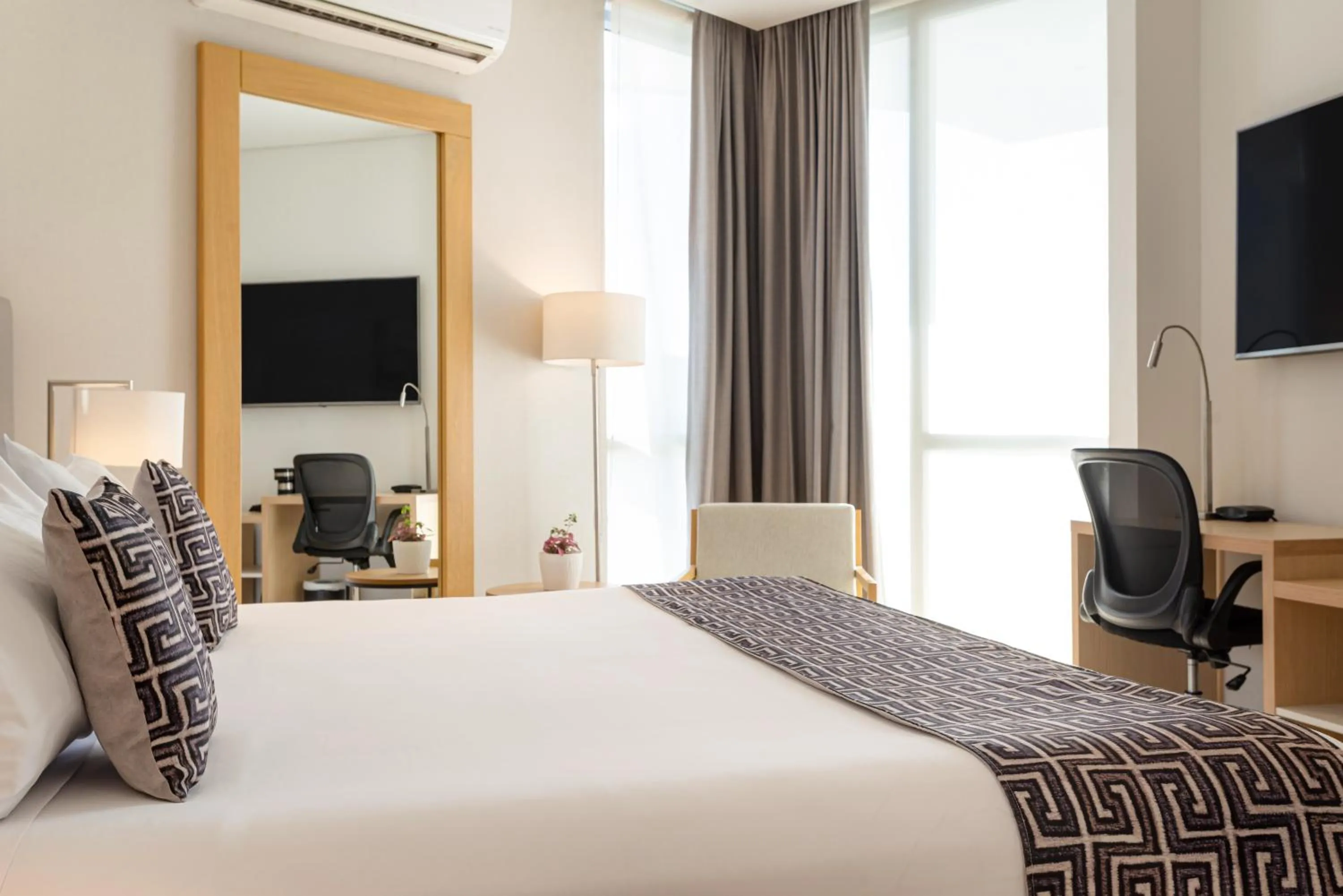 Bed in Grand Marina Suites Santa Marta