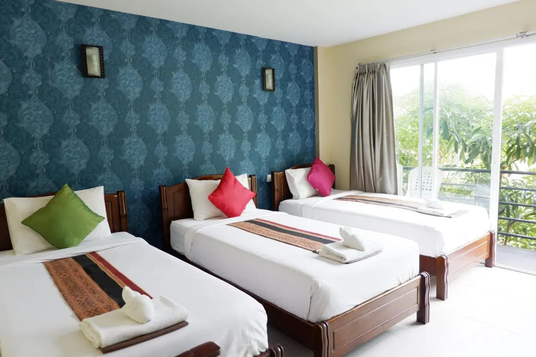 Triple Room with Balcony in Phi Phi Maiyada Resort Triple Room with Balcony in Phi Phi Maiyada Resort