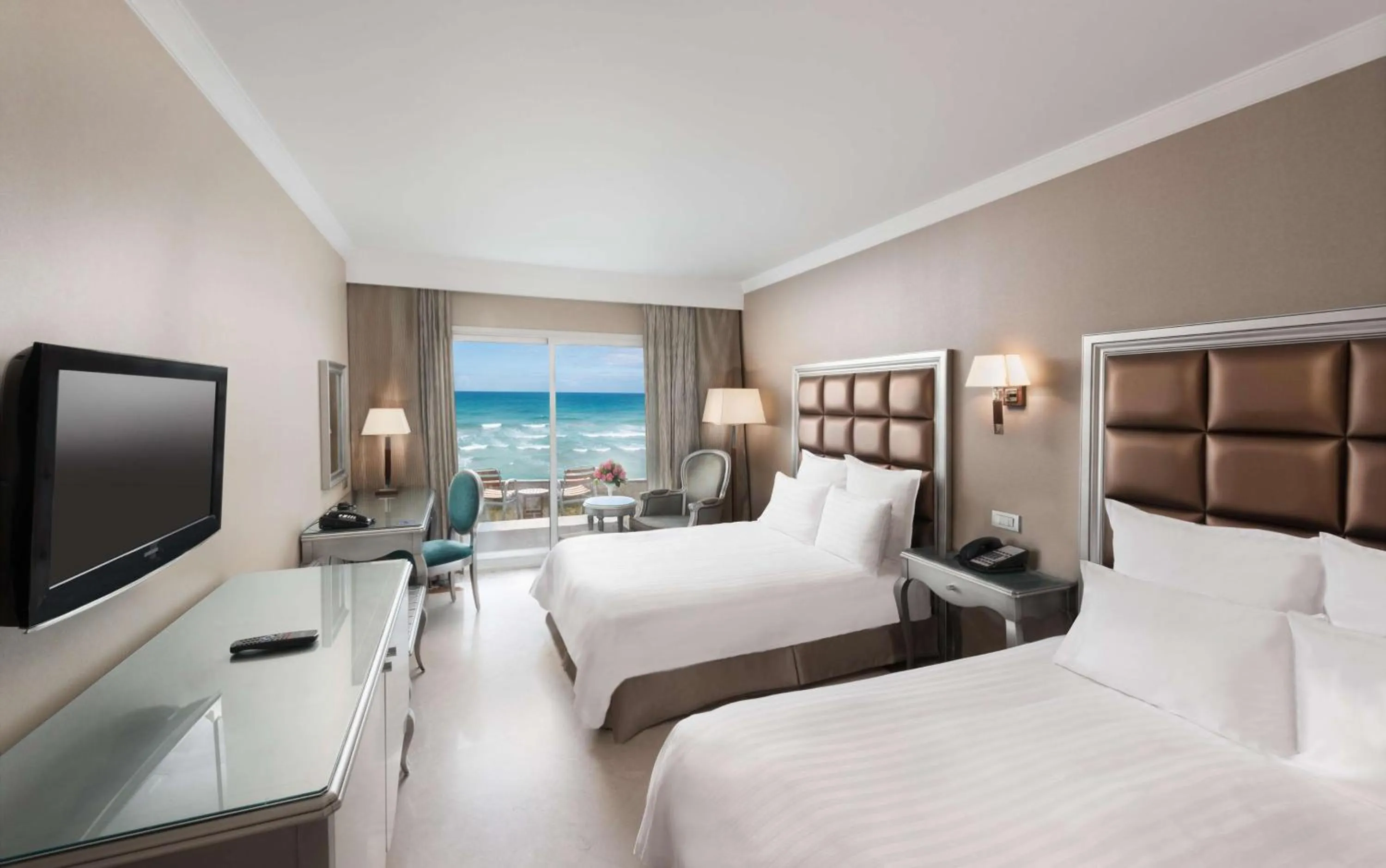 Bed in Hilton Alexandria Corniche Hotel