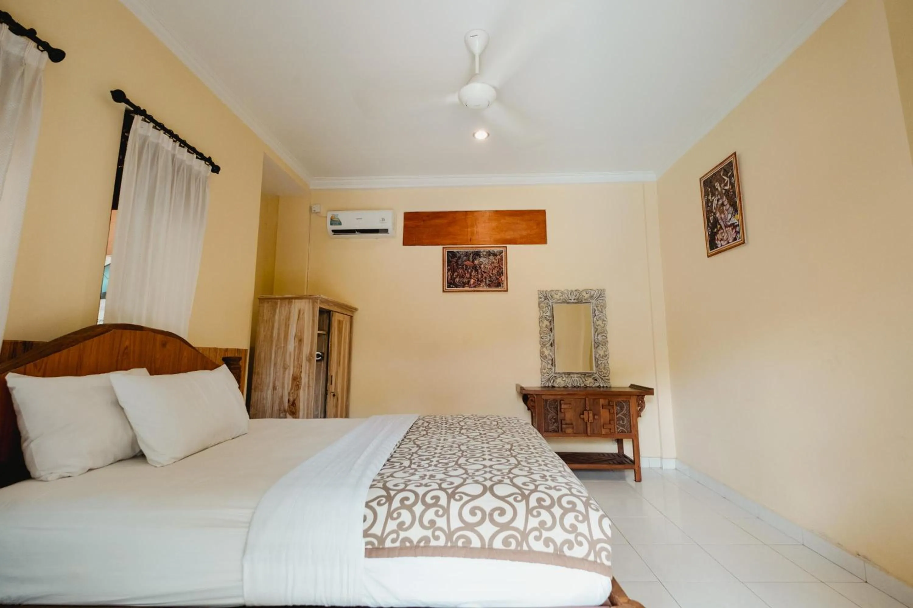 Bed in Rizky Guesthouse