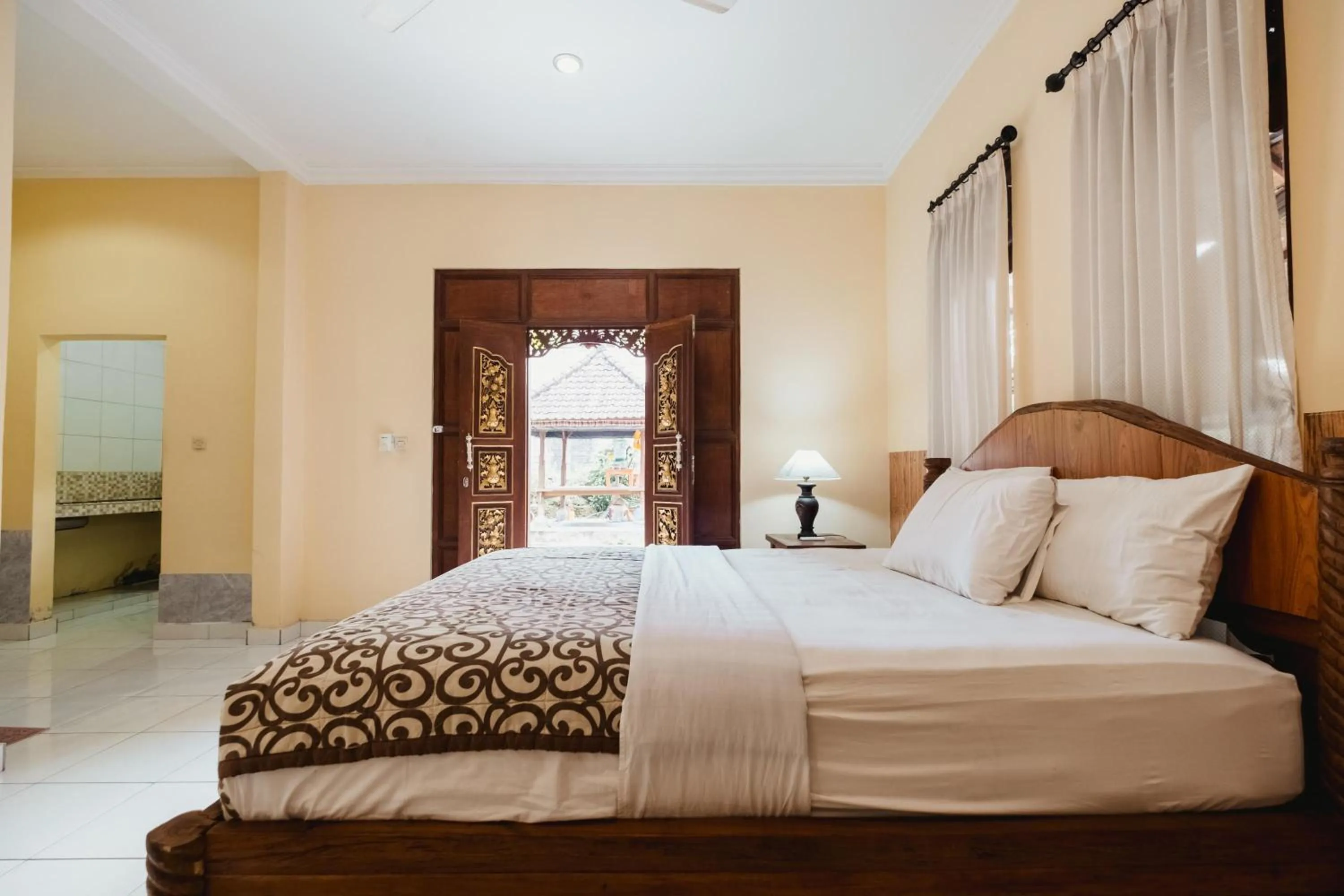 Bed in Rizky Guesthouse