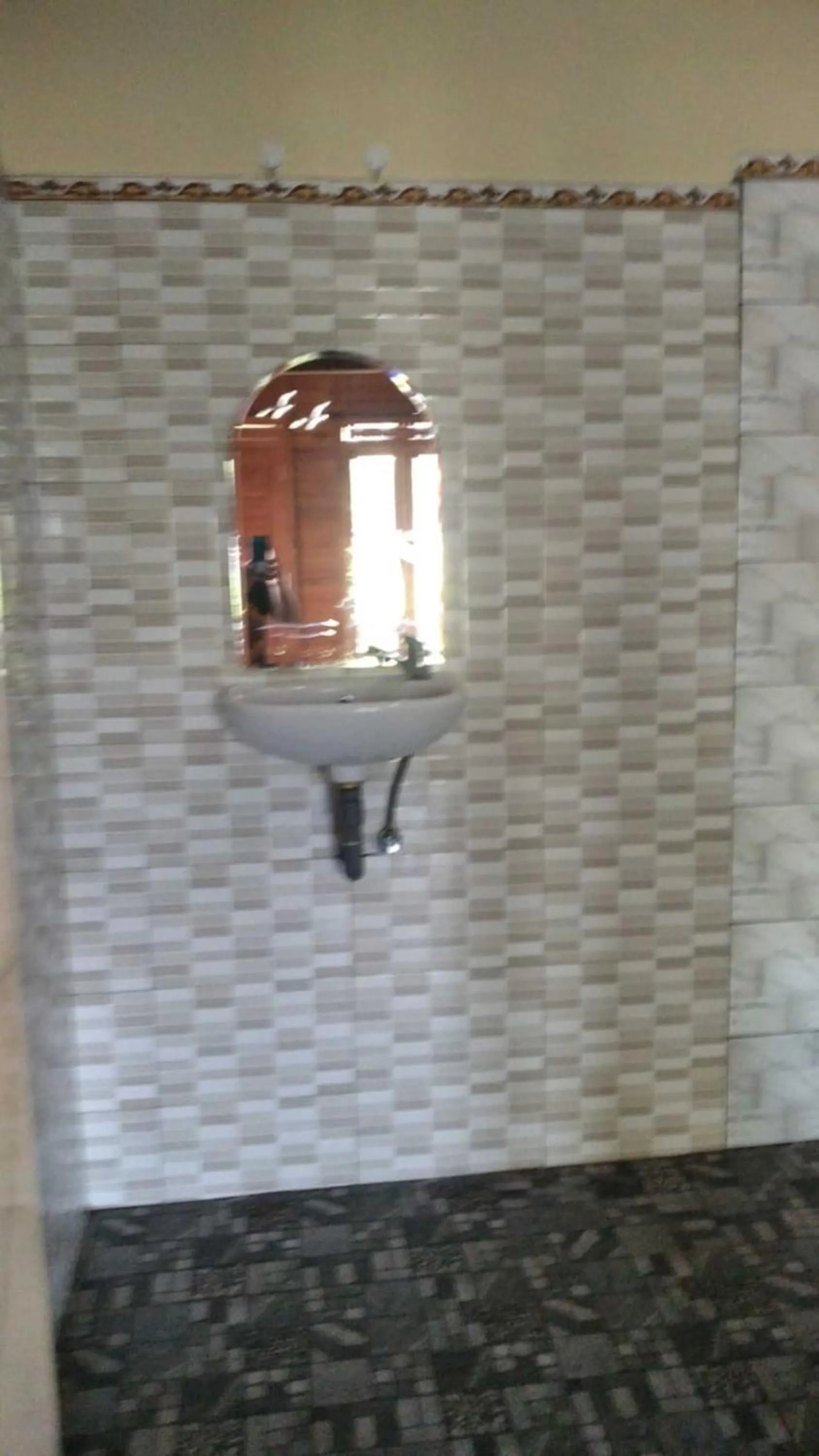 Bathroom in Rizky Guesthouse