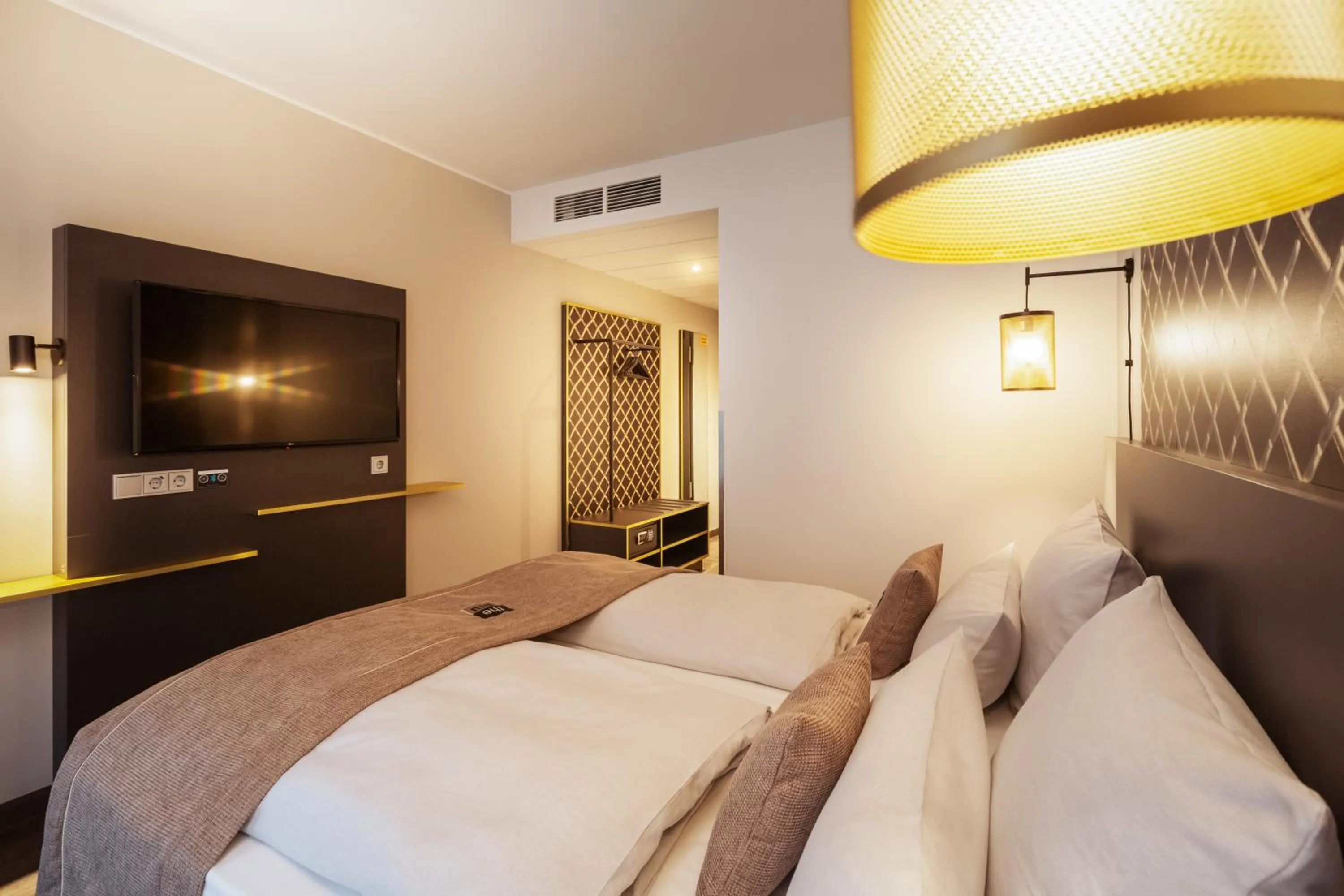 Photo of the whole room, Bed in Holiday Inn - the niu, Mesh Stuttgart Messe by IHG