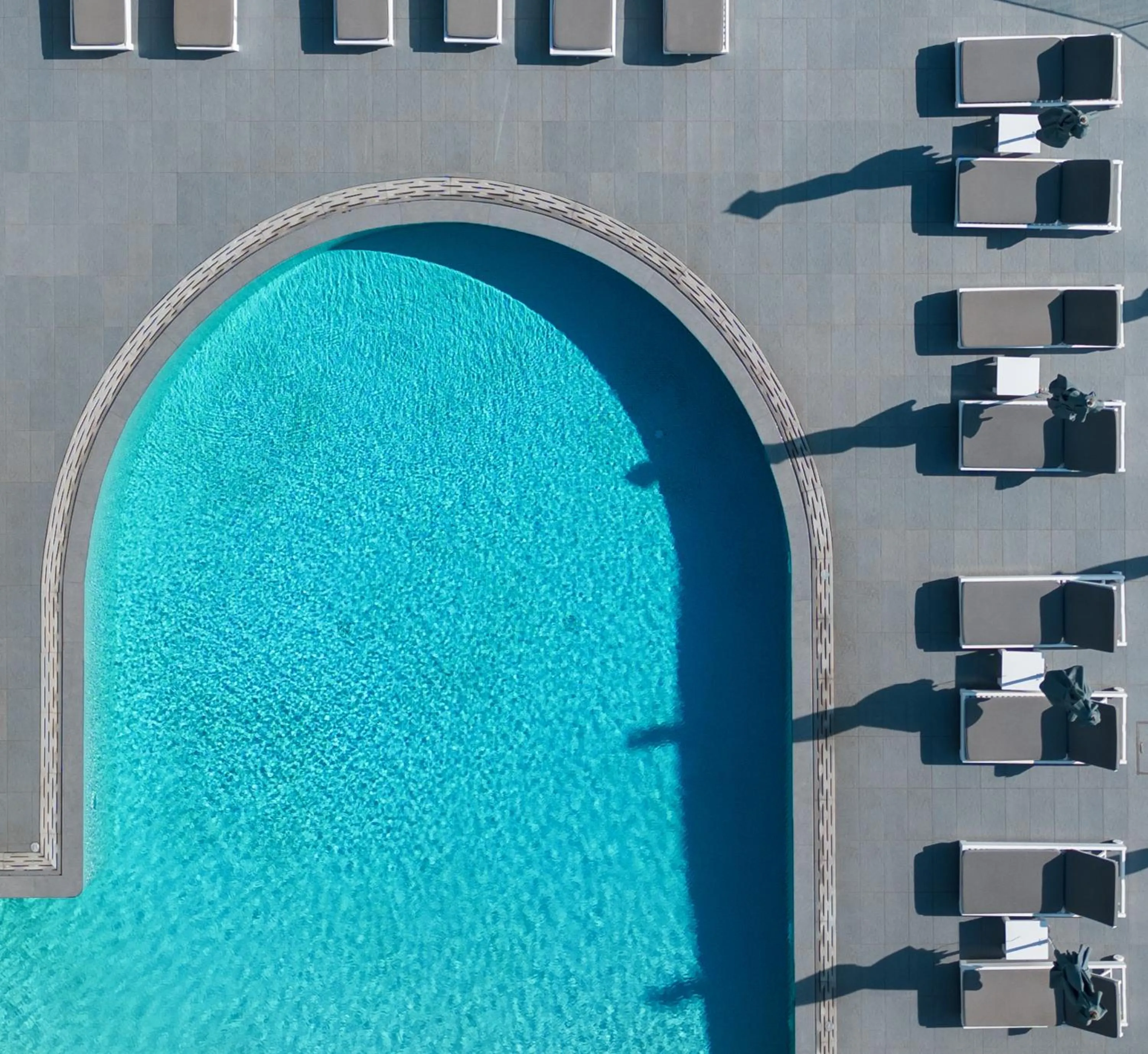 Swimming pool in Acroterra Rosa Luxury Suites & Spa