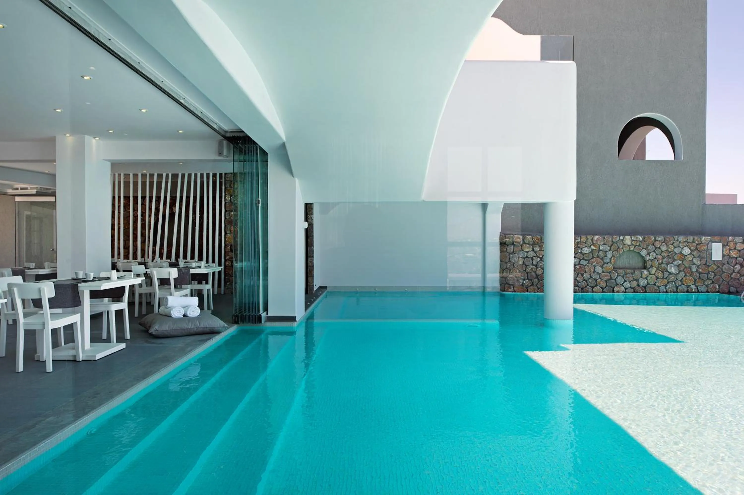 Swimming pool in Acroterra Rosa Luxury Suites & Spa