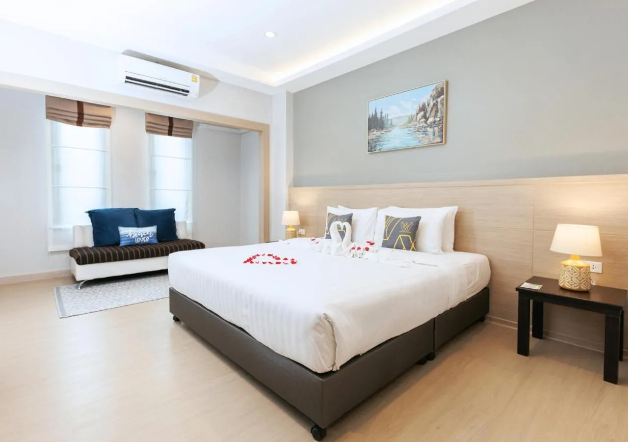 Bed in Baan Phor Phan Hotel