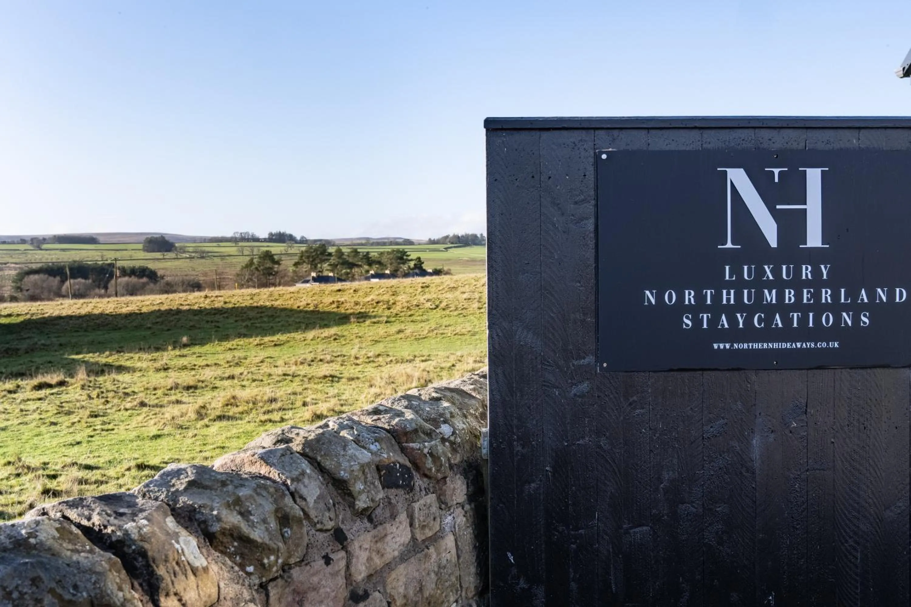 Property logo or sign in Northern Hideaways Sunnyside