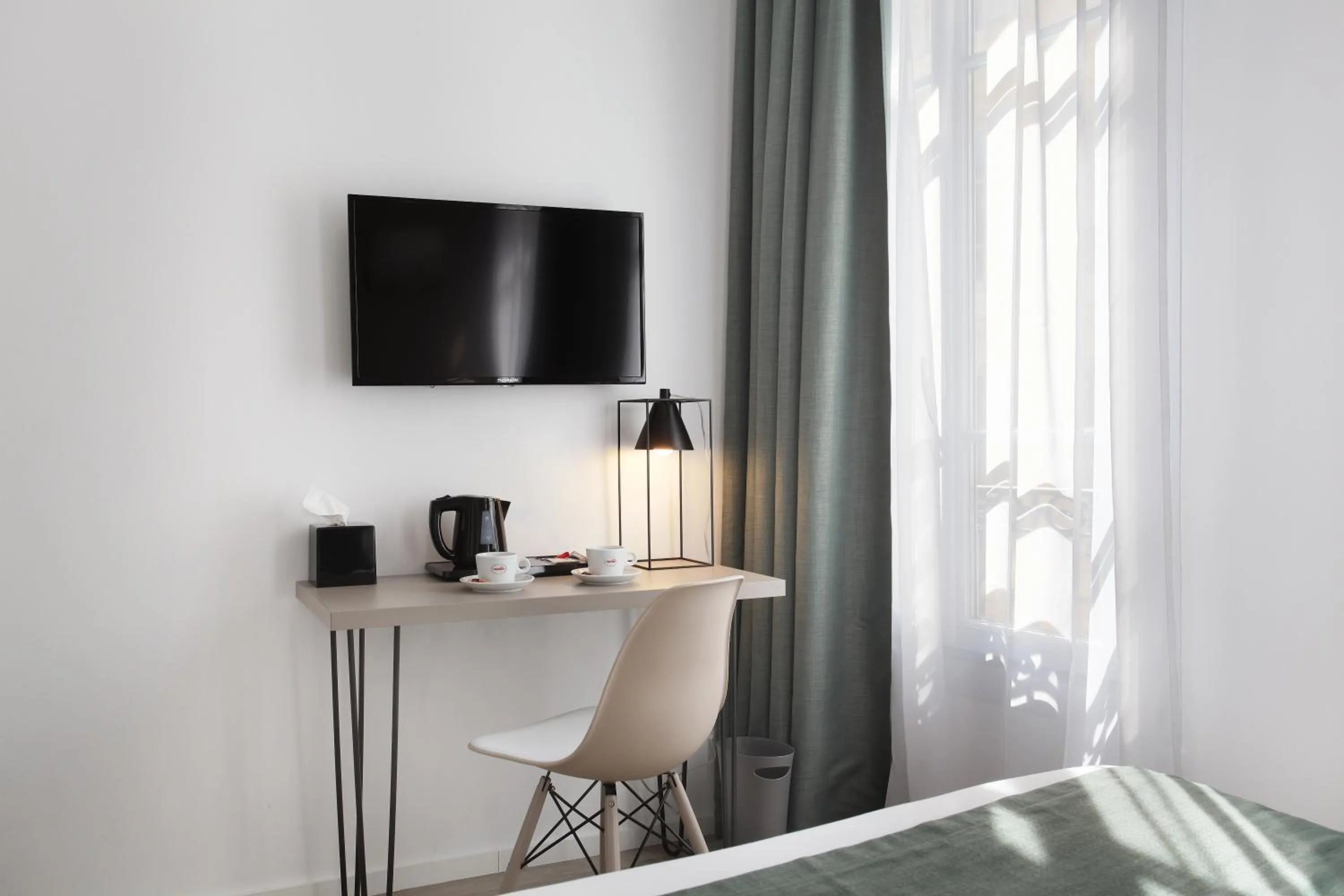 Bedroom in Hôtel Alcôve Nice