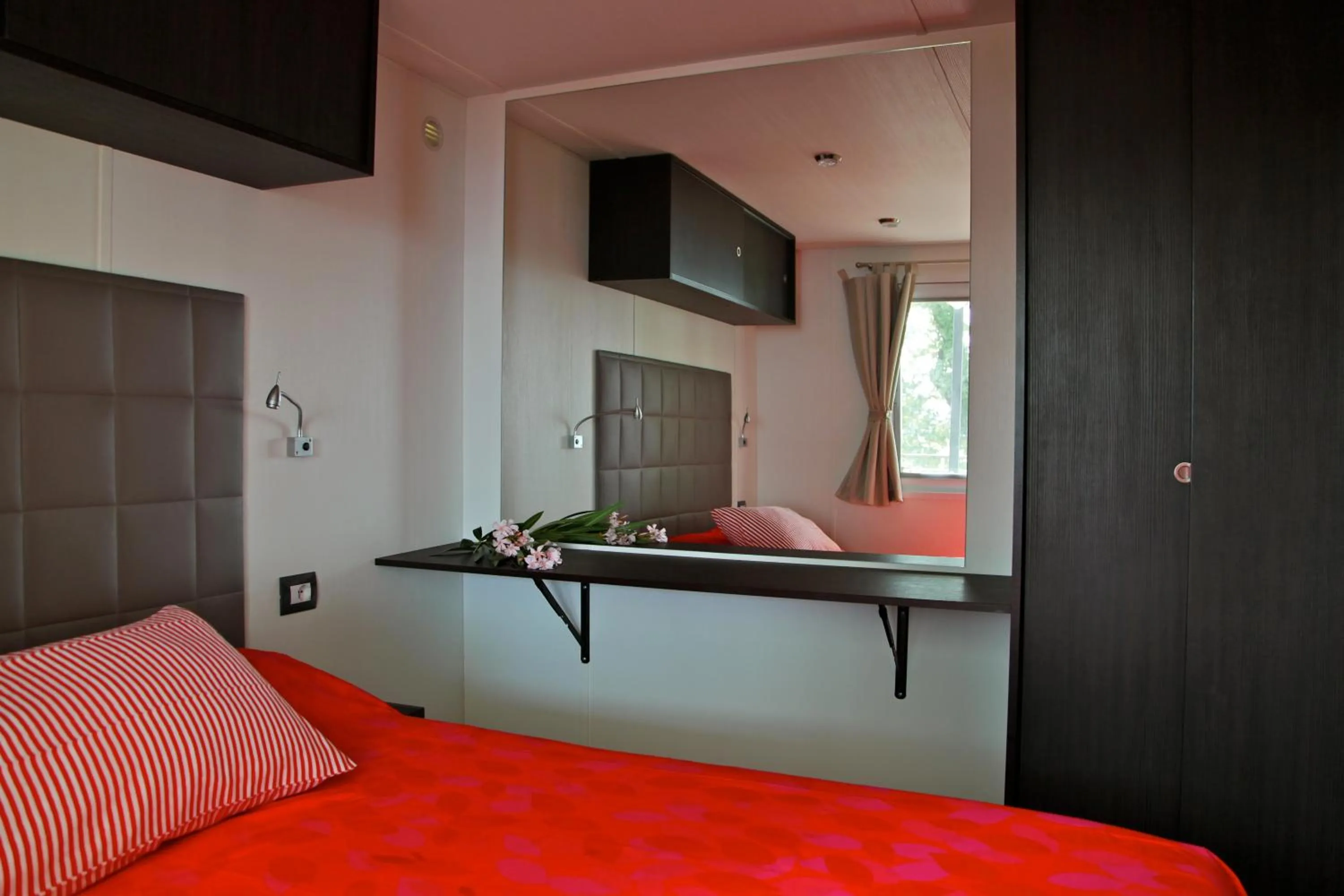 Decorative detail, Bed in Campeggio Europa Silvella