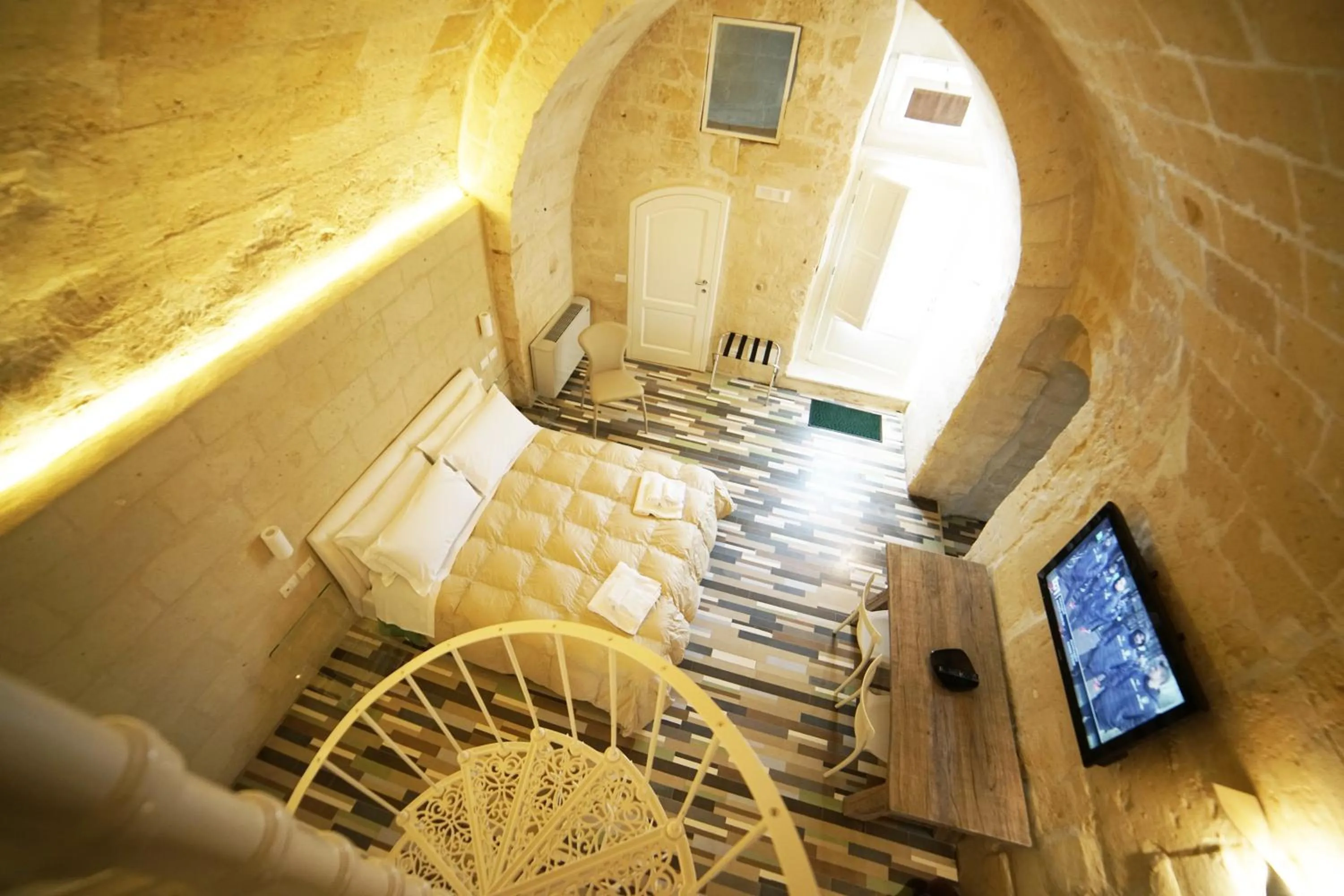 Communal lounge/ TV room in Sassolino Dimora Storica