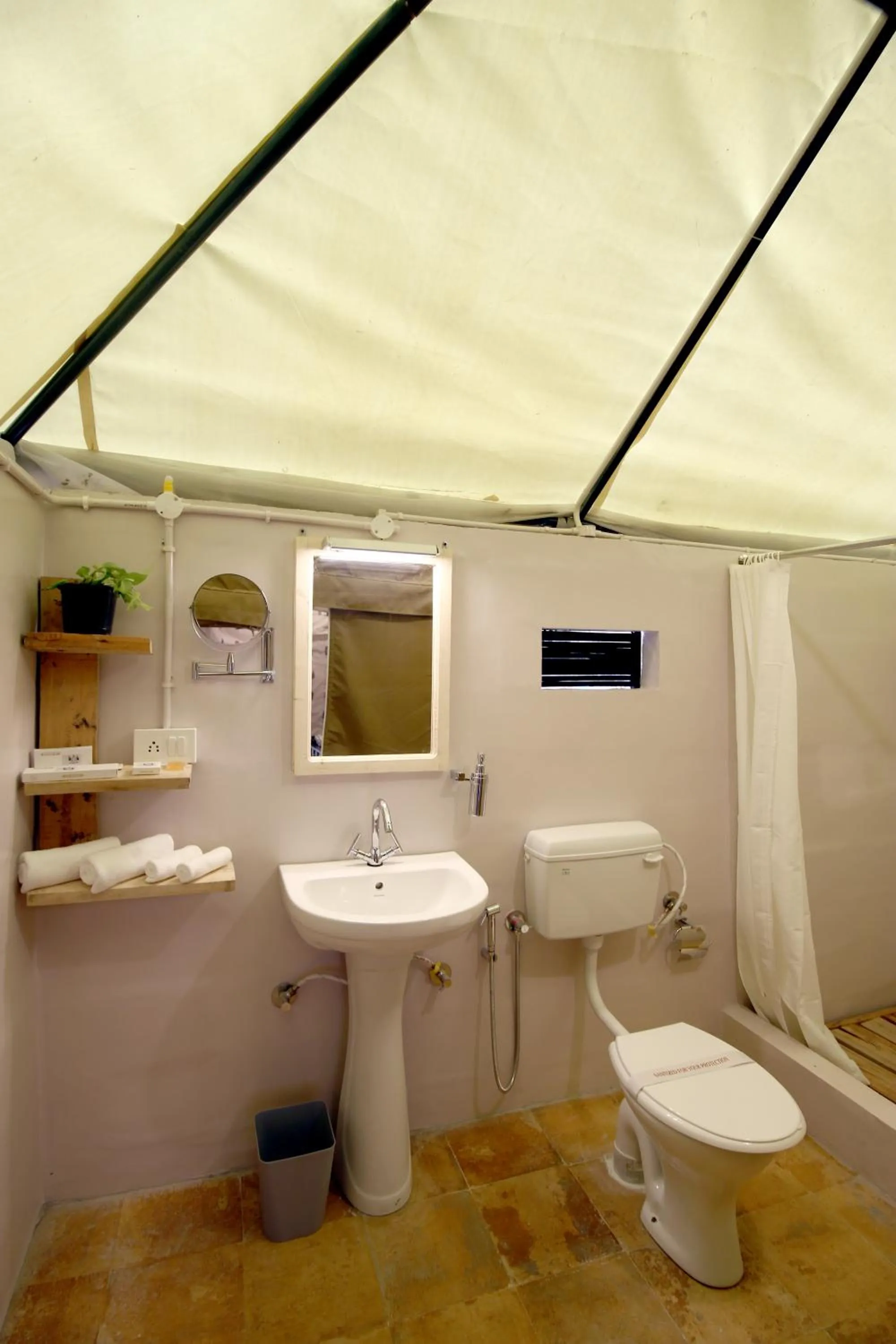 Shower in Dev Bhoomi Farms & Cottages