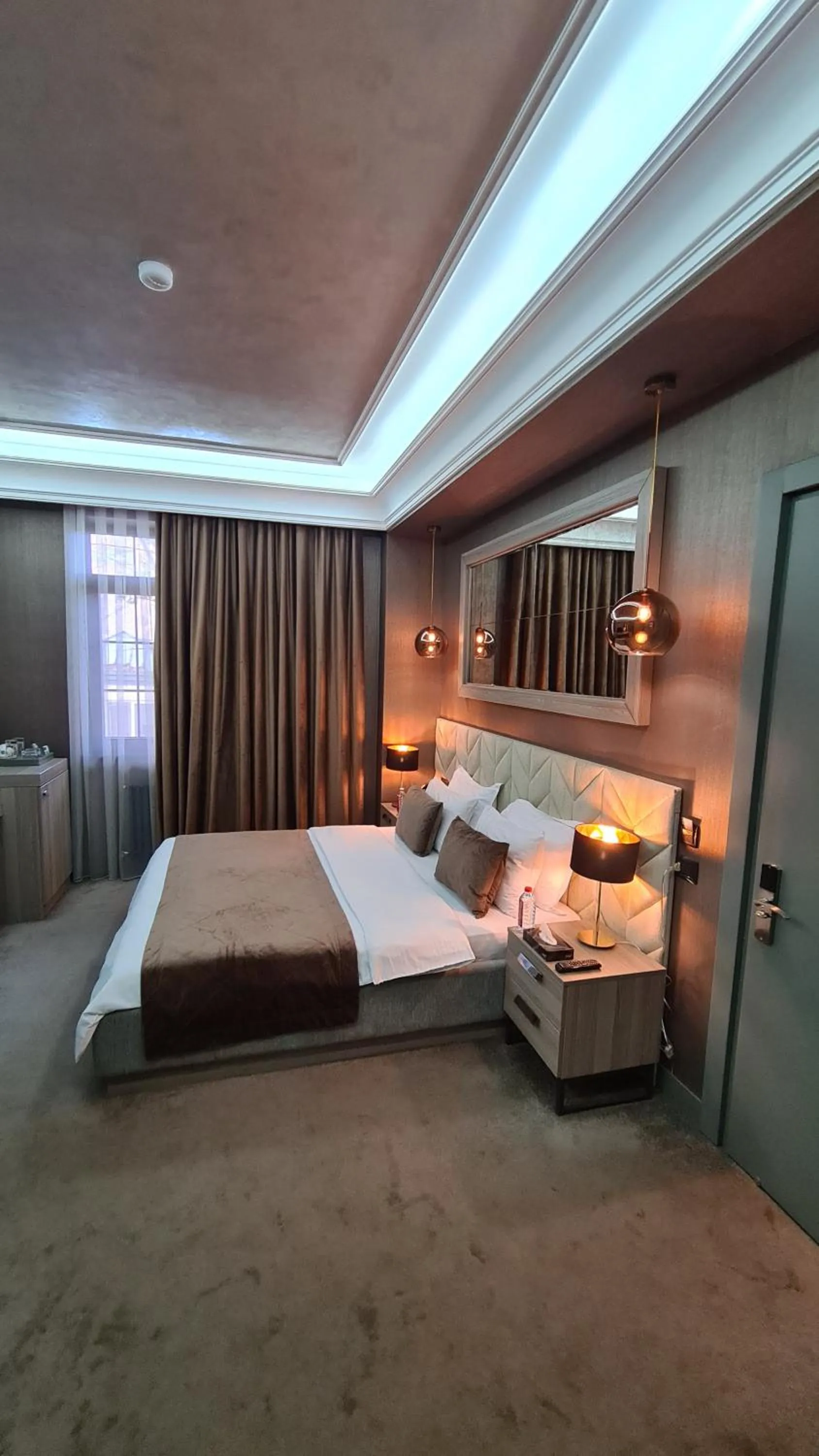 Bed in Home Boutique Hotel