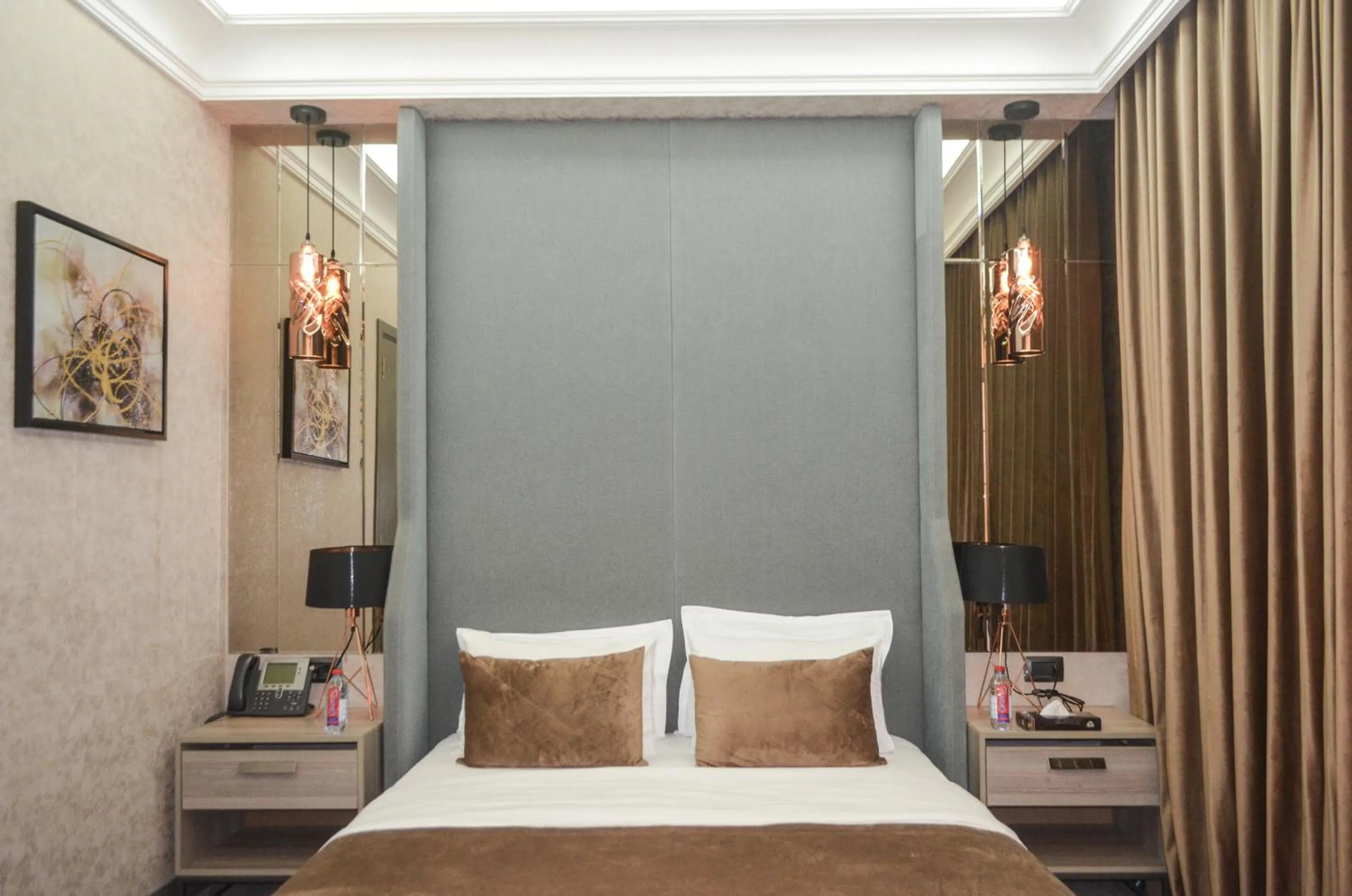 Bed in Home Boutique Hotel