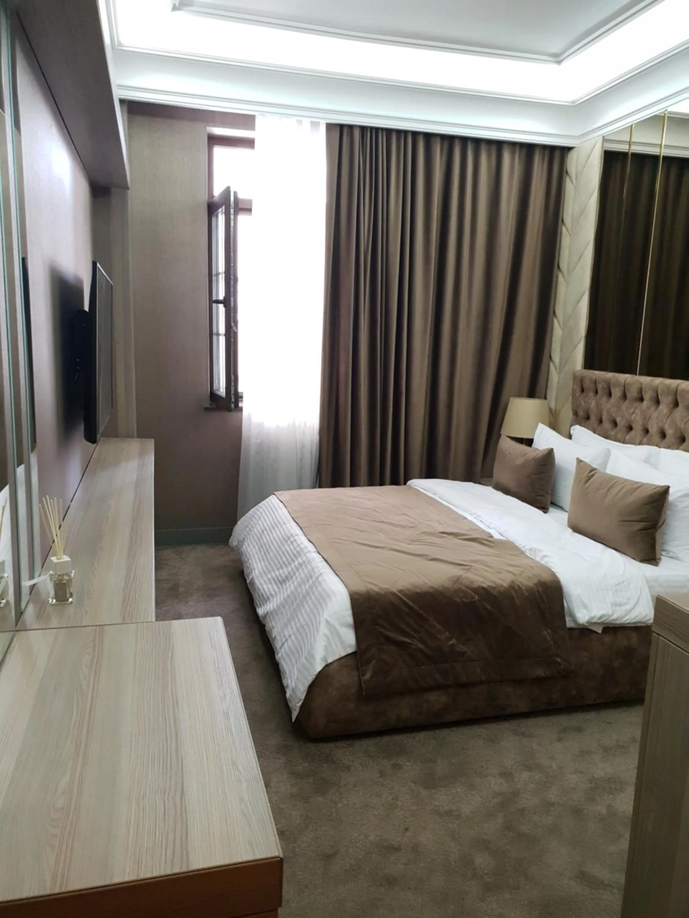 Bed in Home Boutique Hotel