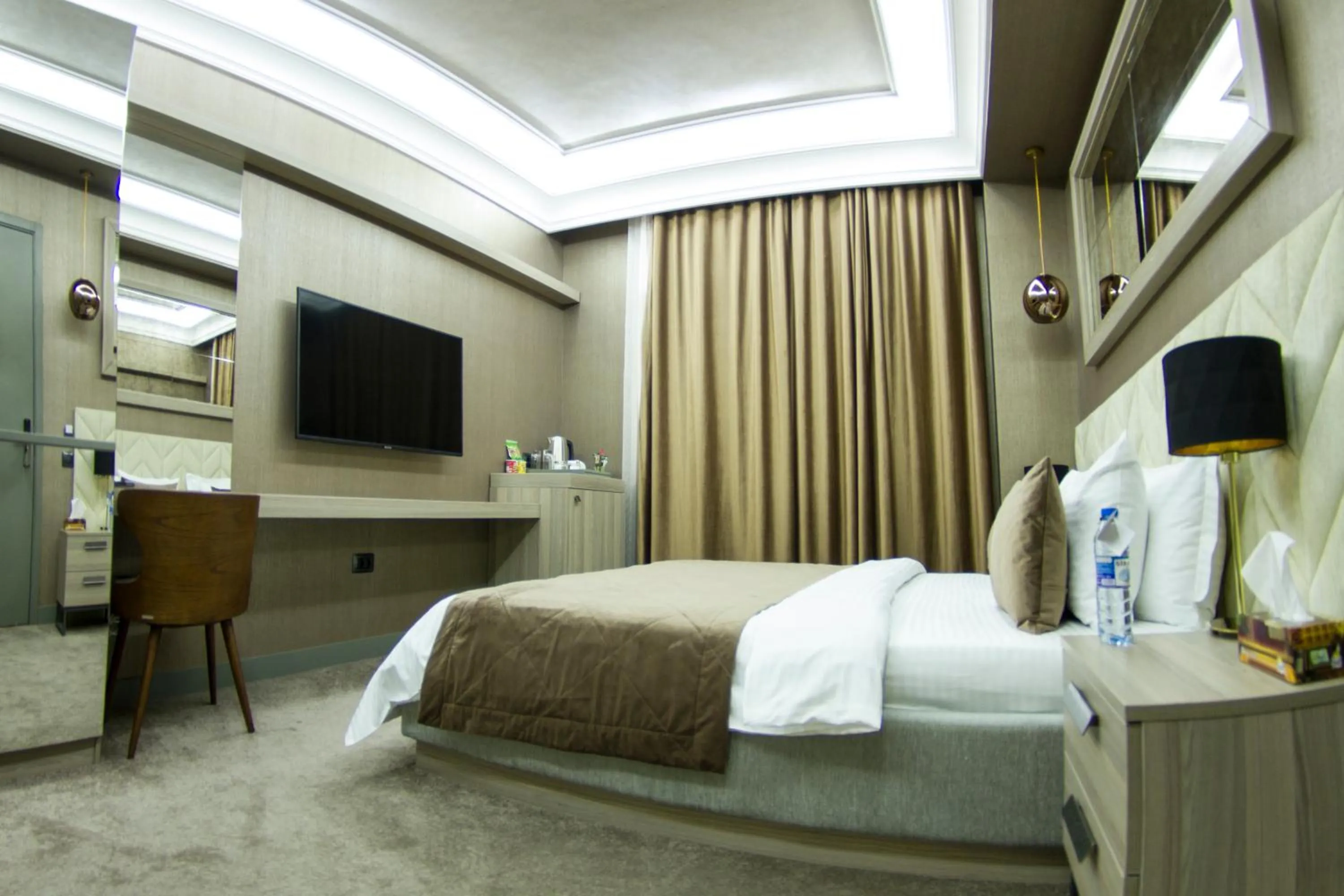 Bed in Home Boutique Hotel