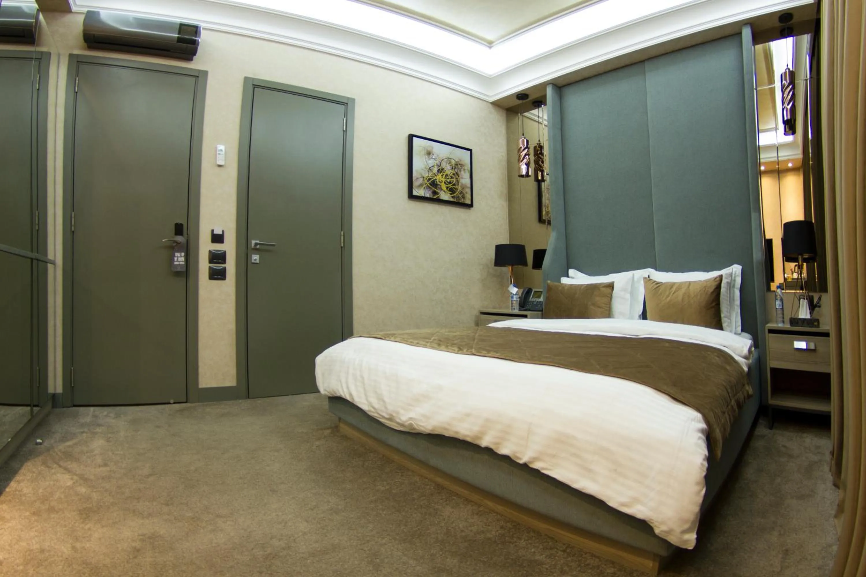 Bed in Home Boutique Hotel