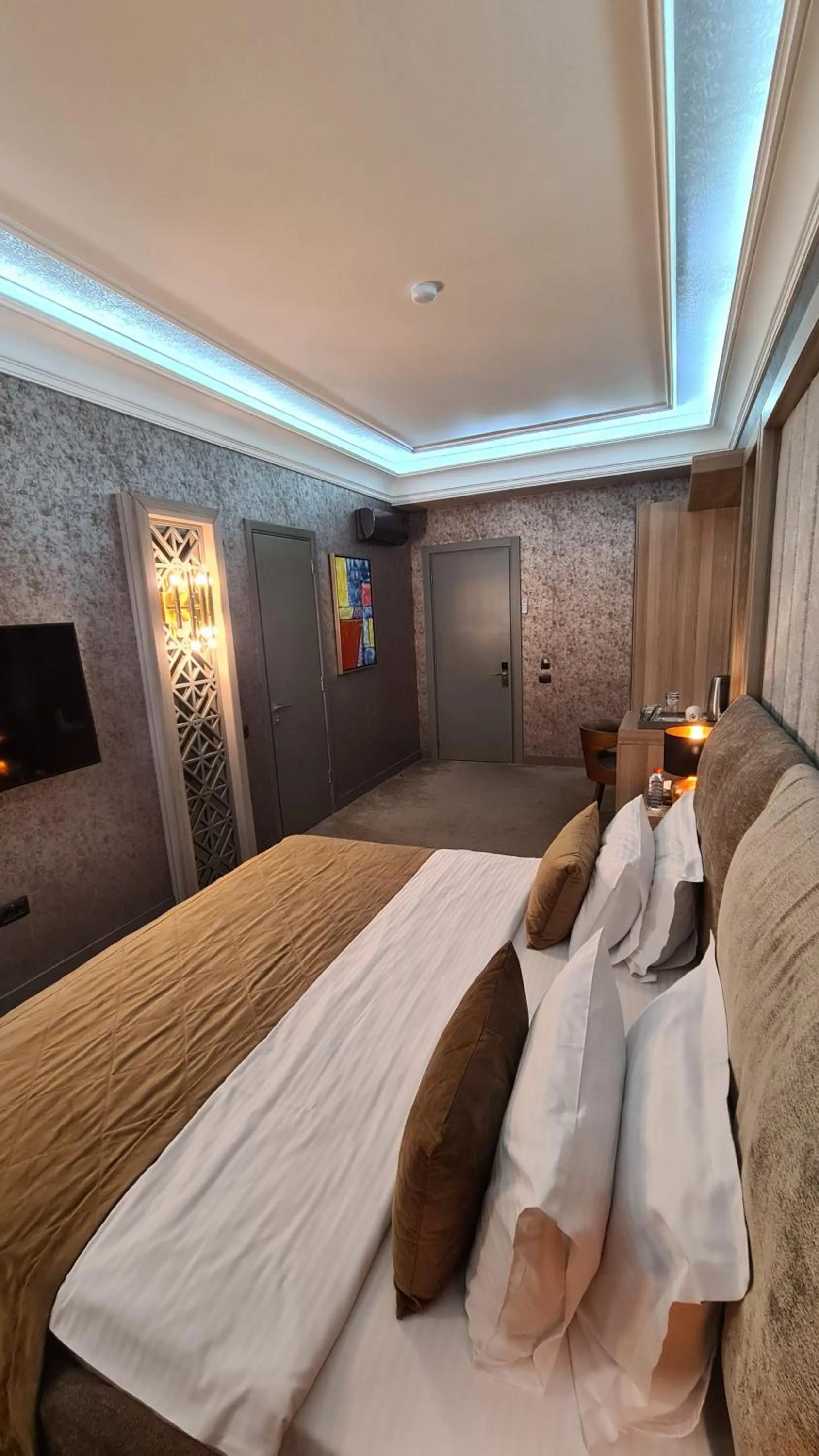 Bed in Home Boutique Hotel