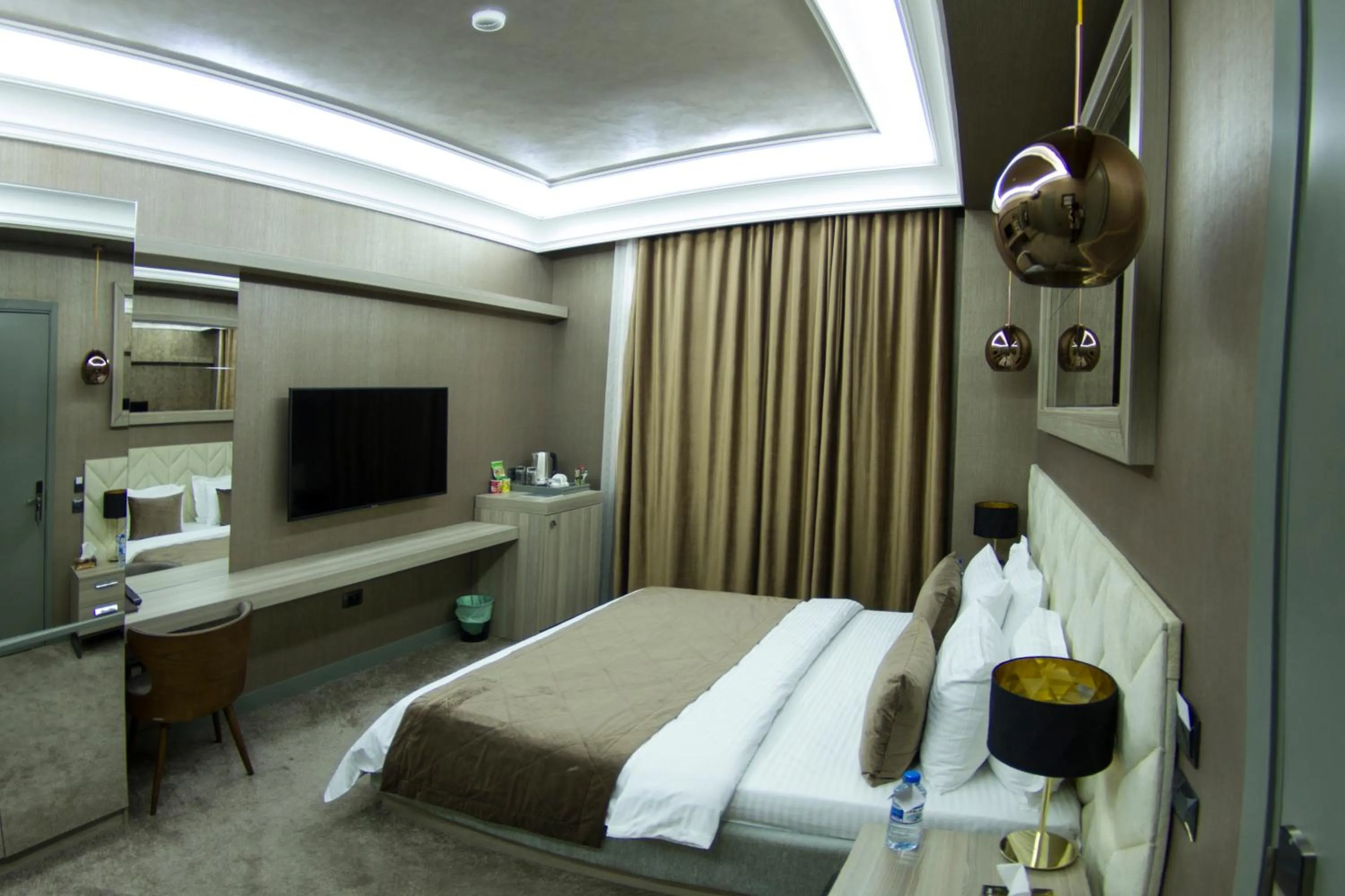 Bed in Home Boutique Hotel