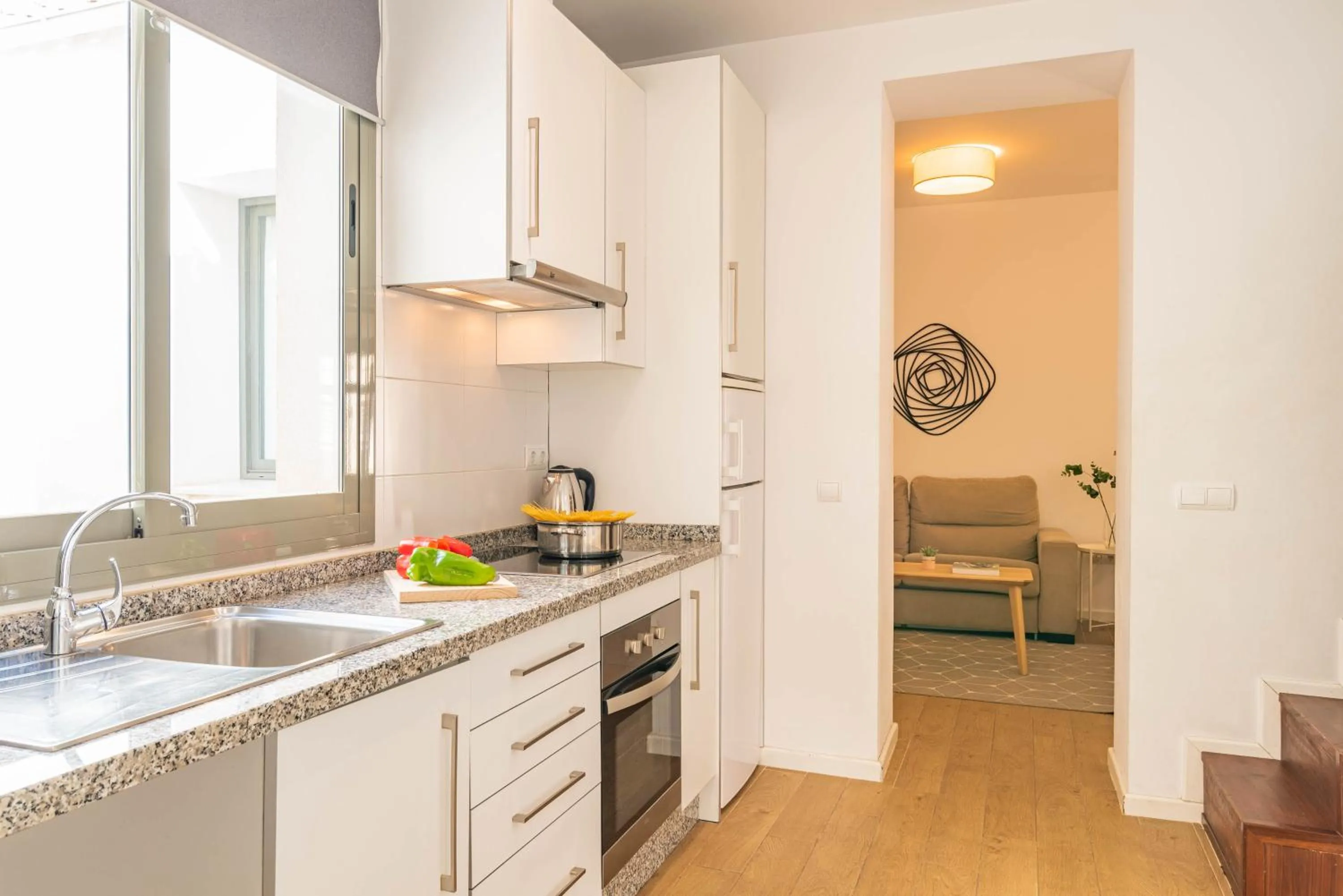Kitchen or kitchenette in Feelathome Merced Apartments