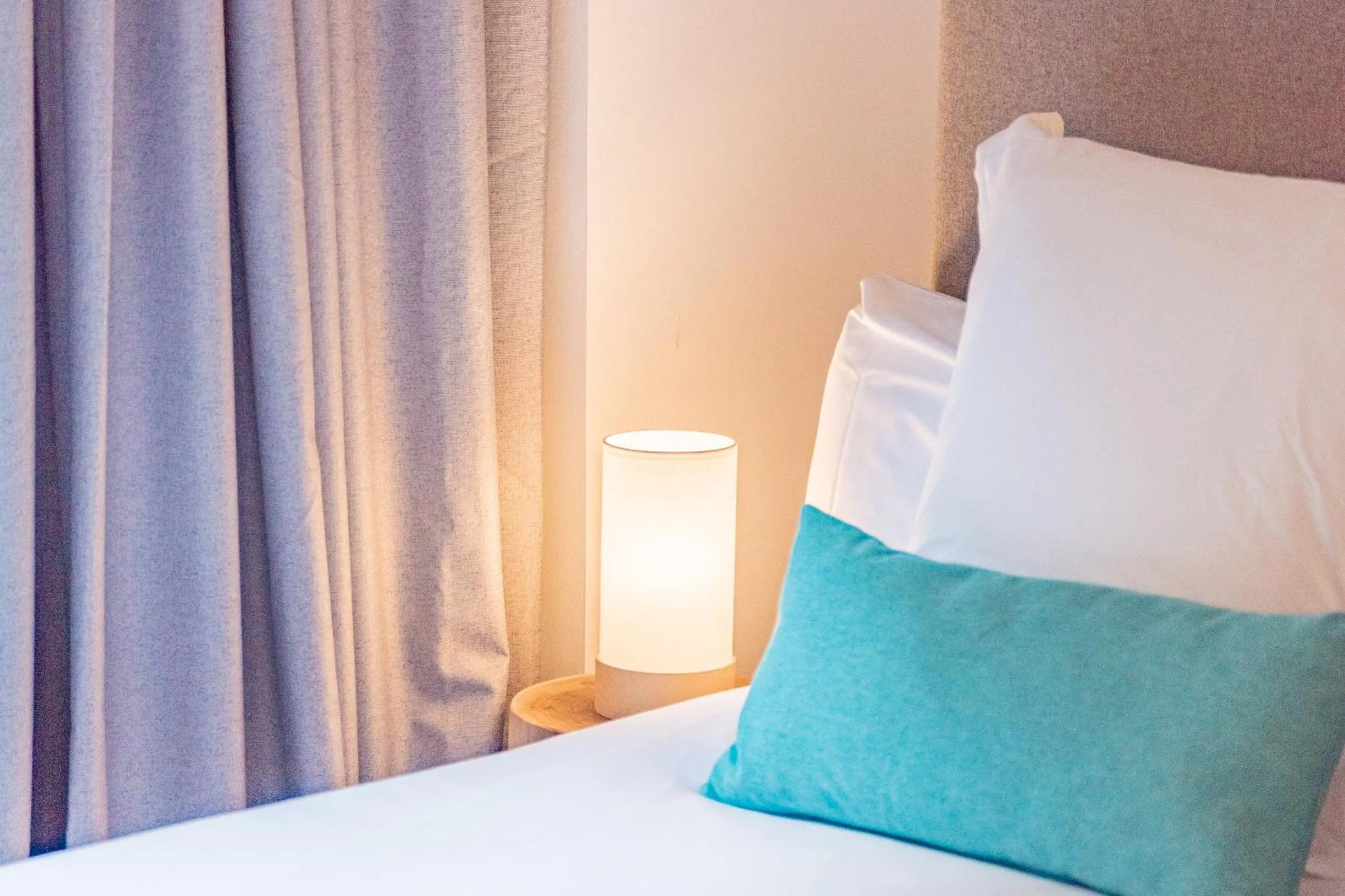 Bed in Feelathome Merced Apartments