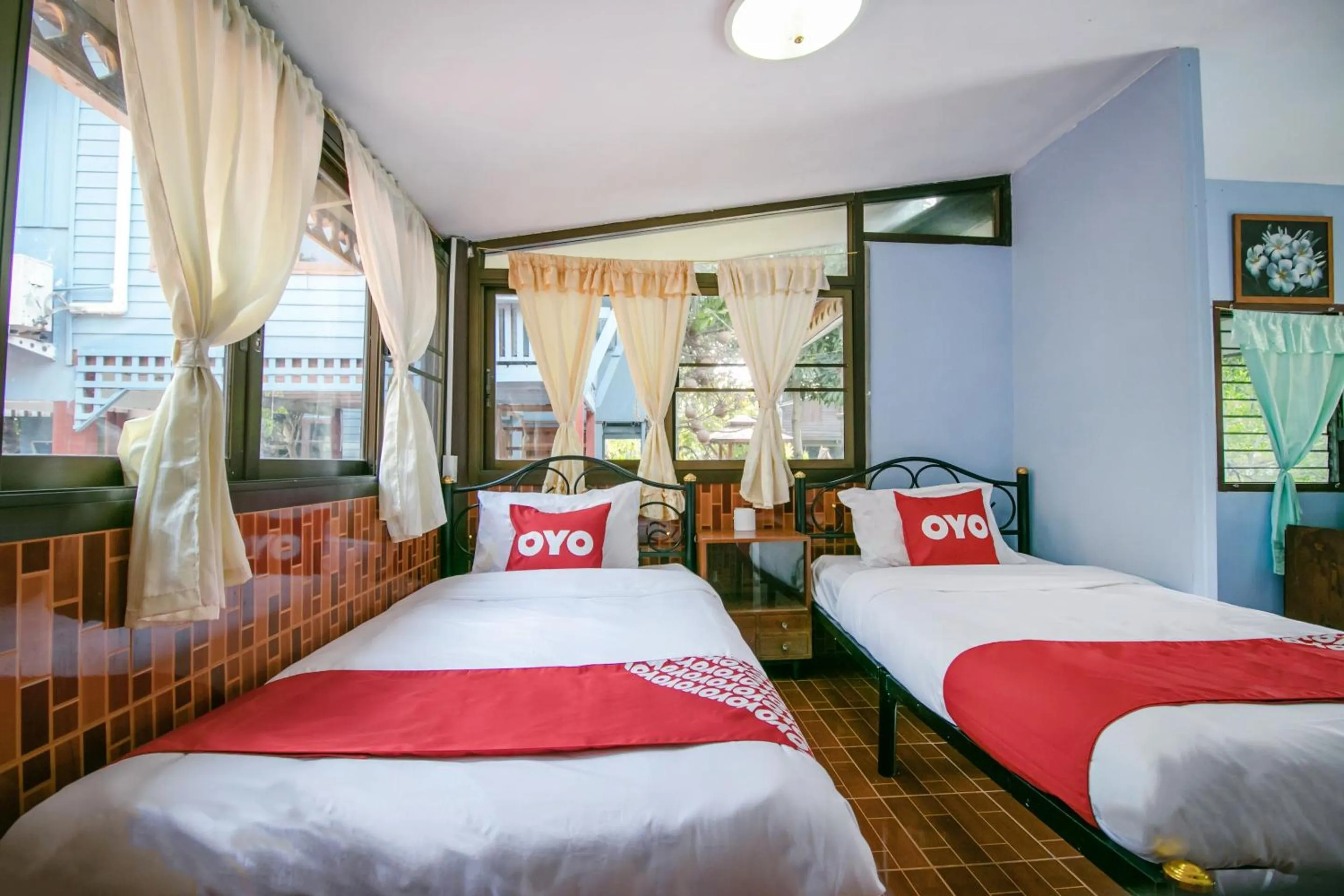 Bedroom in OYO 402 Raknatee Resort