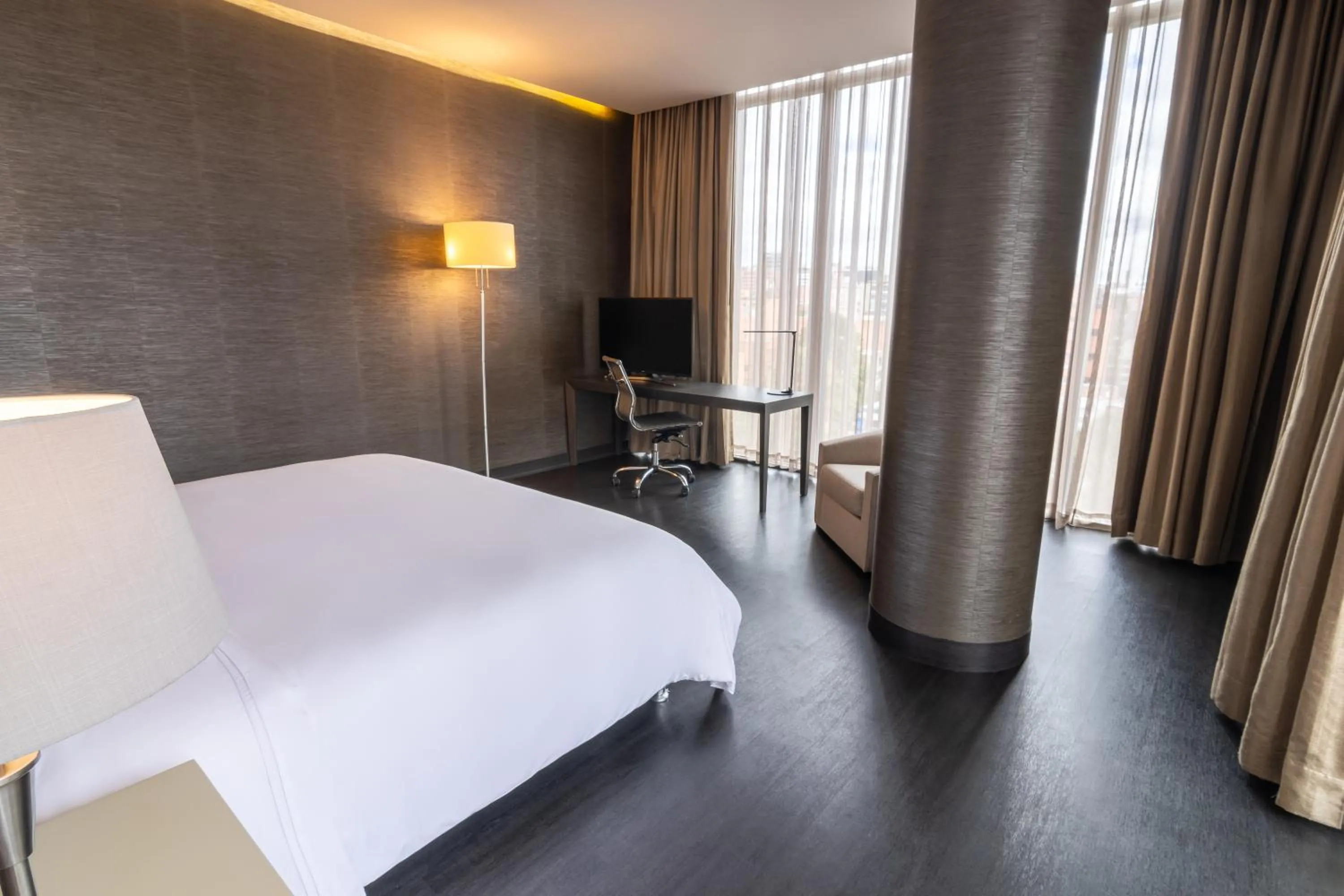 Bed in GHL Bioxury Hotel